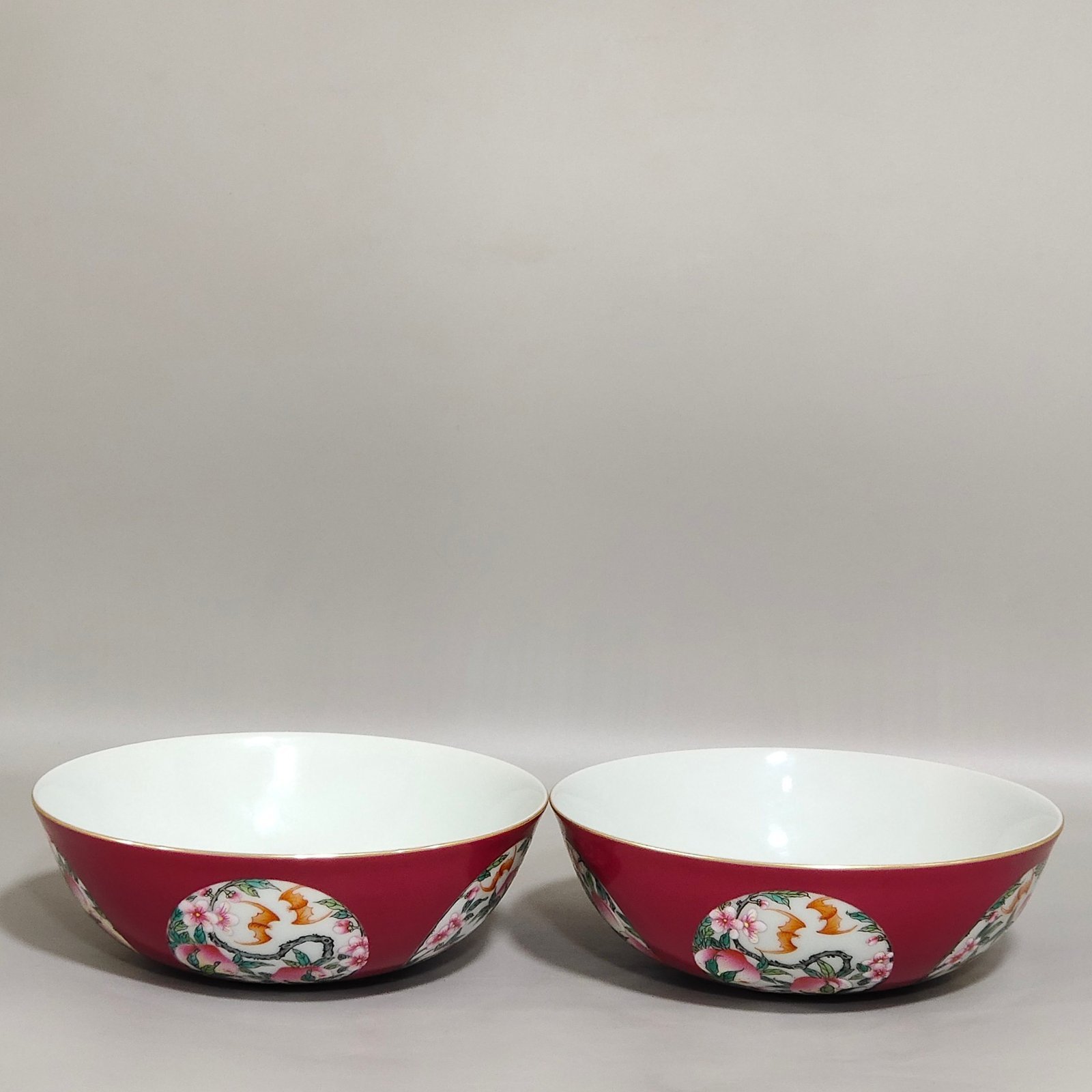 Qing Dynasty Qianlong rouge red windowed longevity peach nest foot bowl