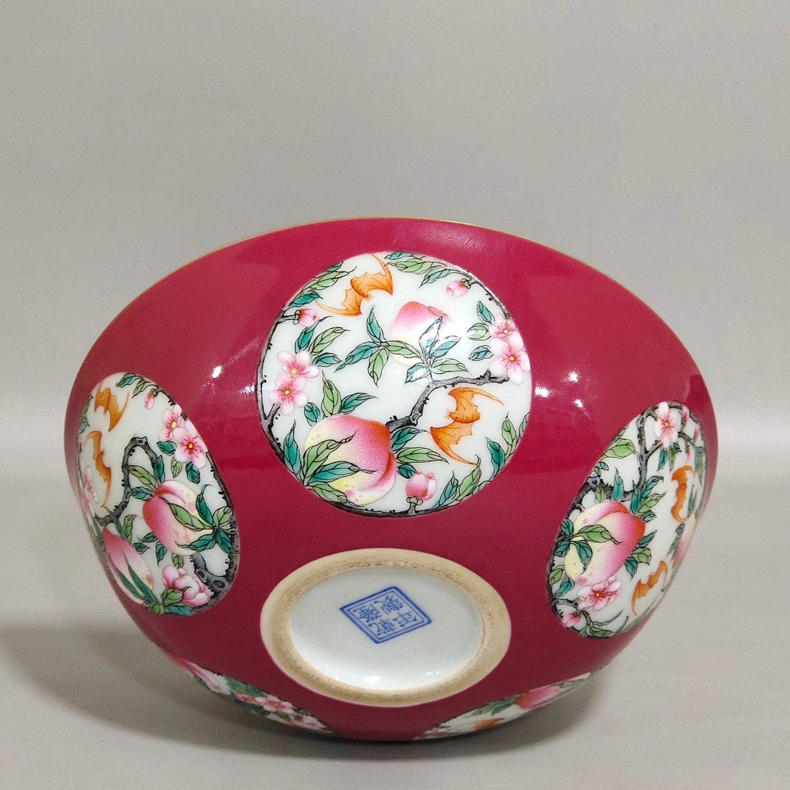 Qing Dynasty Qianlong rouge red windowed longevity peach nest foot bowl