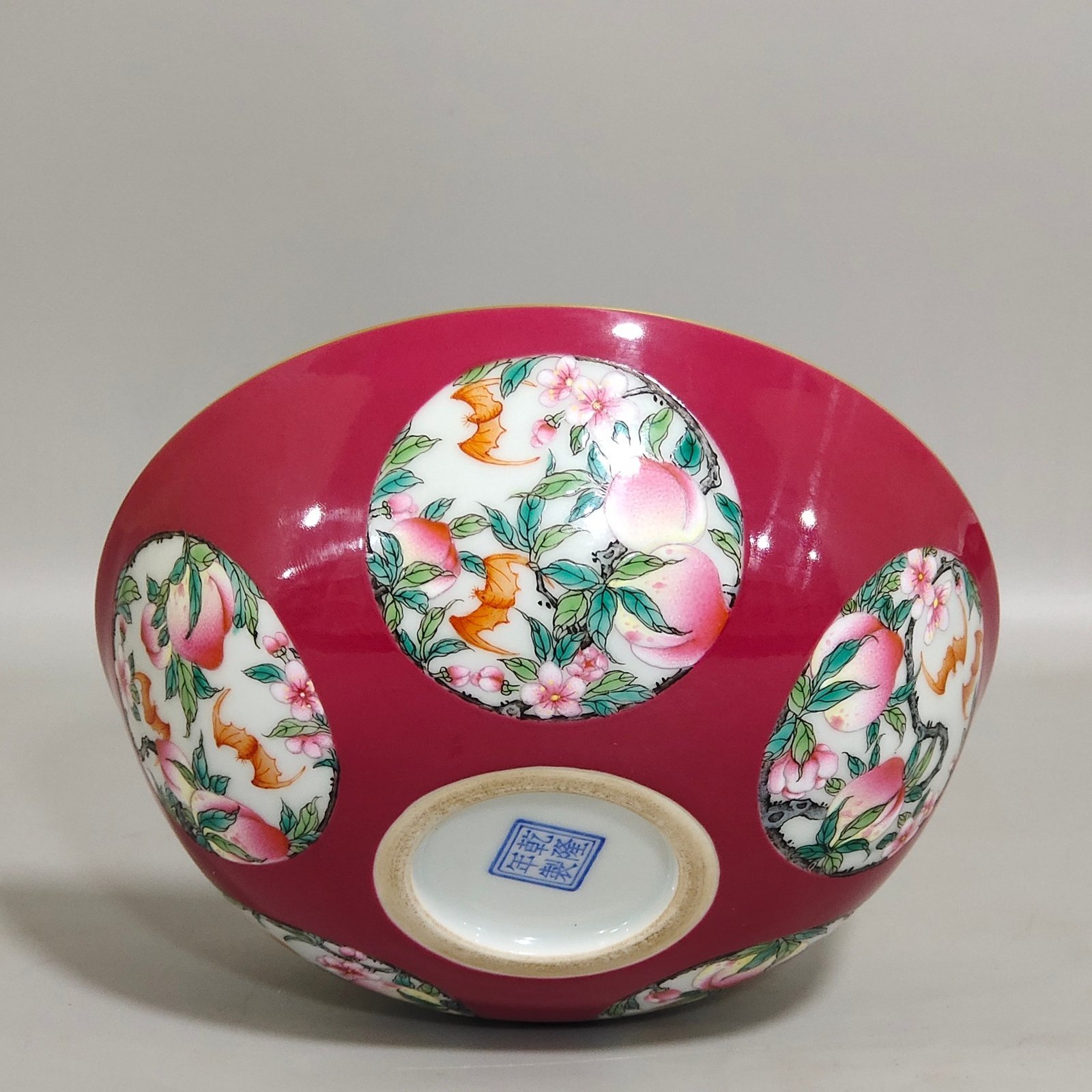 Qing Dynasty Qianlong rouge red windowed longevity peach nest foot bowl