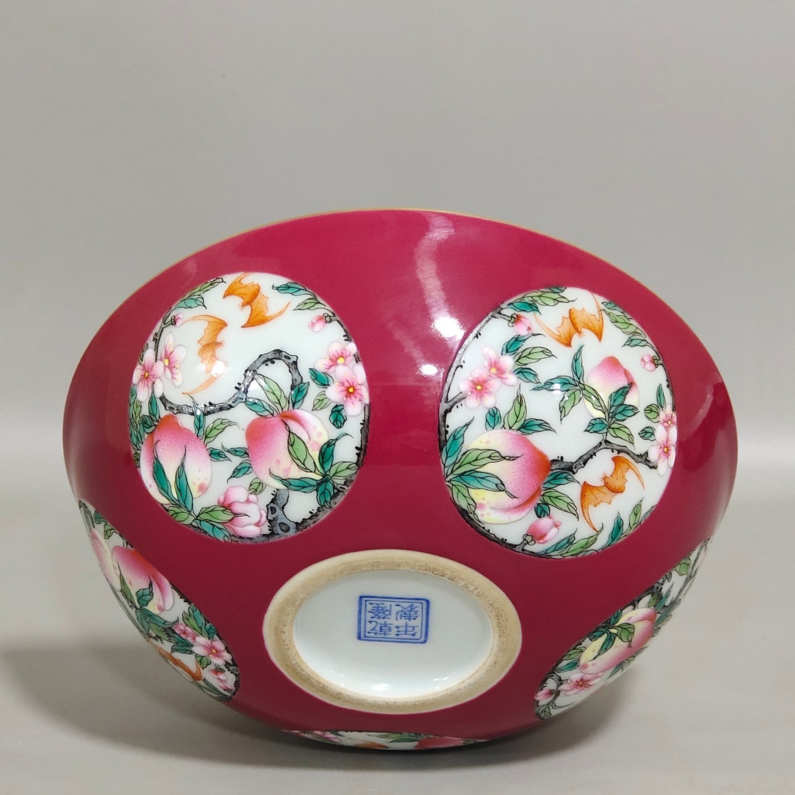 Qing Dynasty Qianlong rouge red windowed longevity peach nest foot bowl