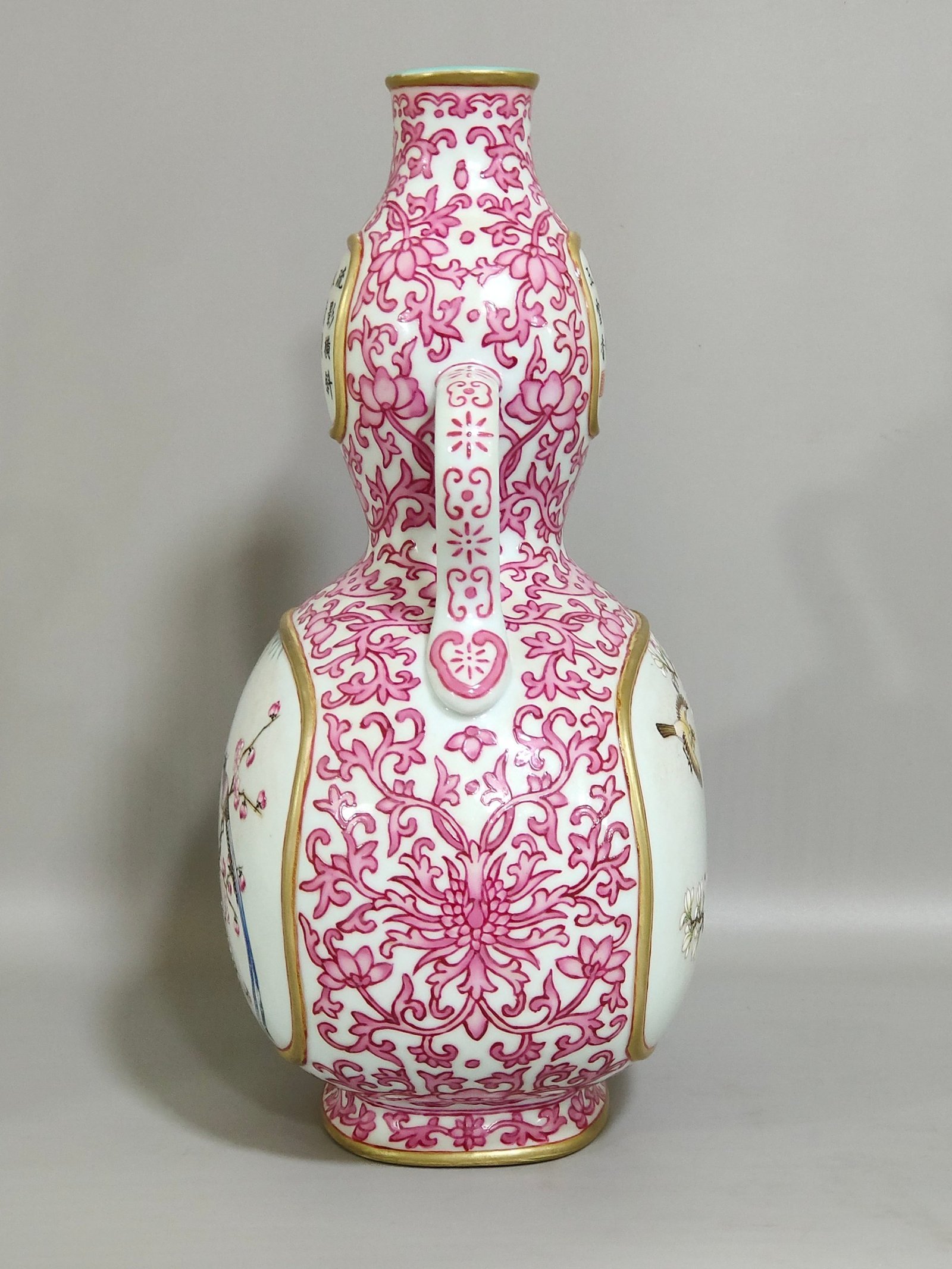 Qing Dynasty Qianlong rouge red windowed flat gourd vase with flowers and birds inscribed with poems