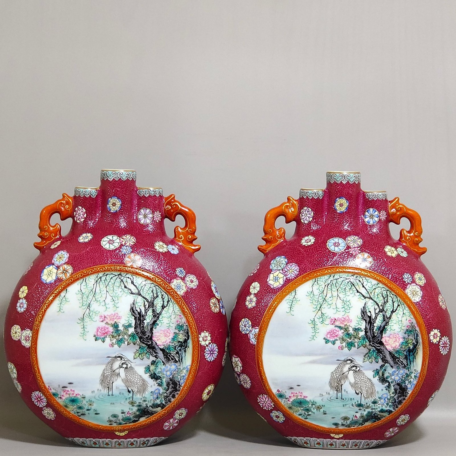 Qing Dynasty Qianlong rouge red leather ball flower opening window with three tubes holding the moon vase