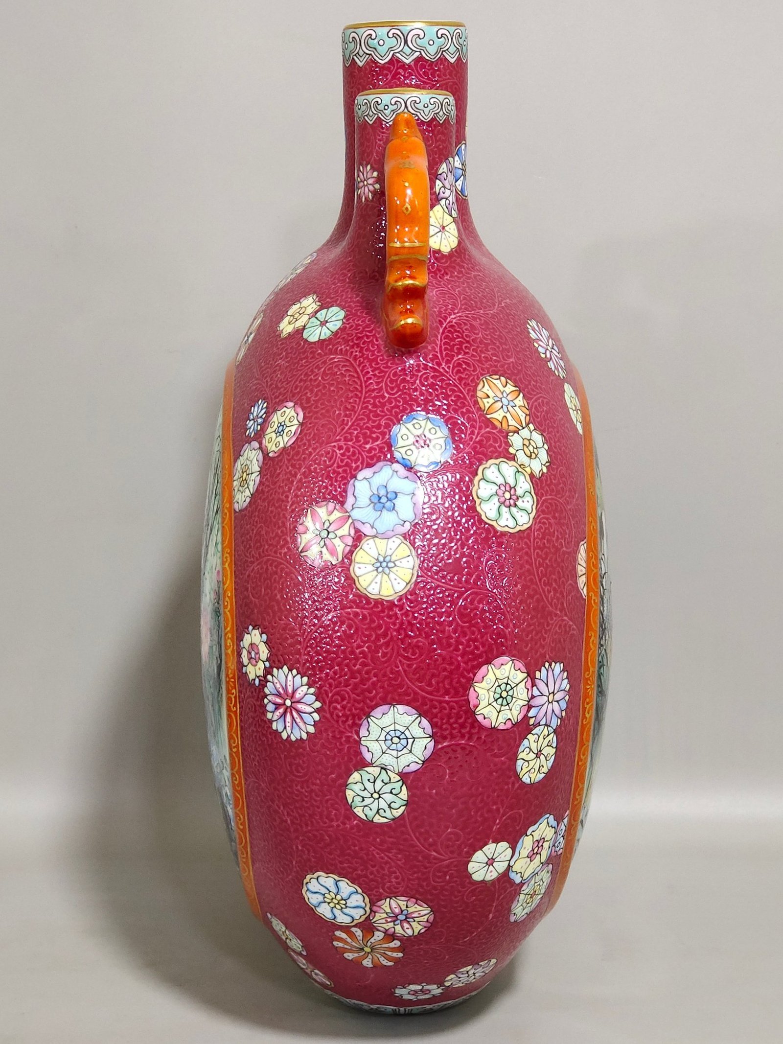 Qing Dynasty Qianlong rouge red leather ball flower opening window with three tubes holding the moon vase