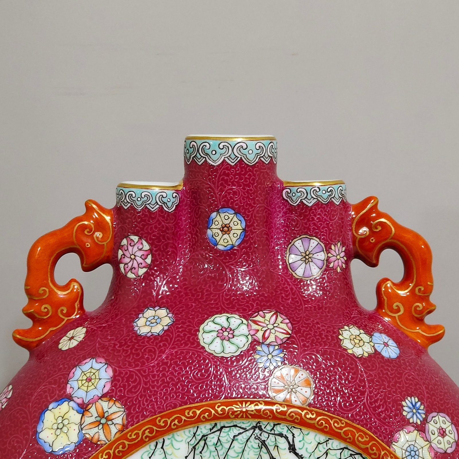 Qing Dynasty Qianlong rouge red leather ball flower opening window with three tubes holding the moon vase