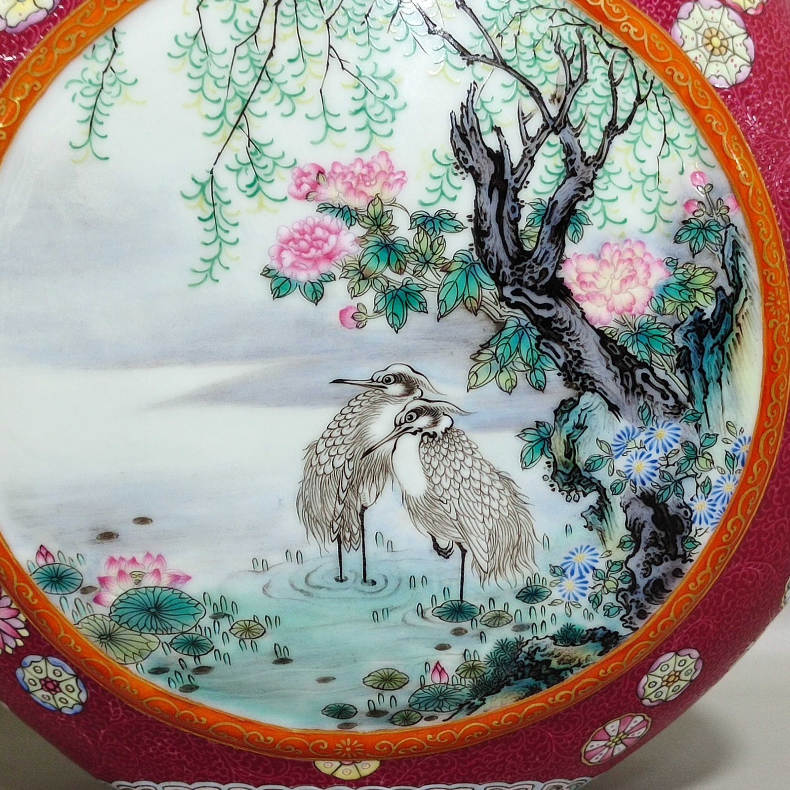 Qing Dynasty Qianlong rouge red leather ball flower opening window with three tubes holding the moon vase