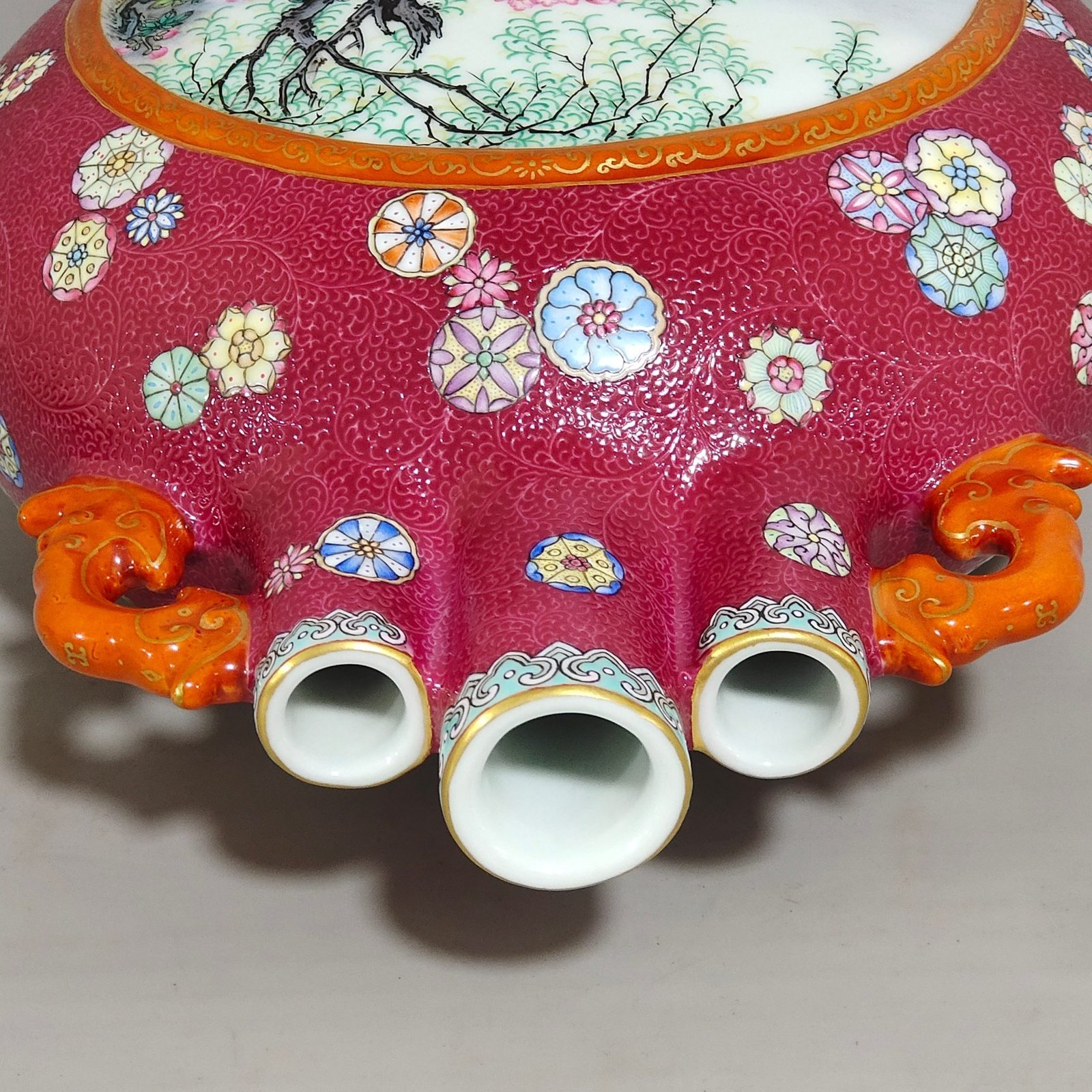 Qing Dynasty Qianlong rouge red leather ball flower opening window with three tubes holding the moon vase