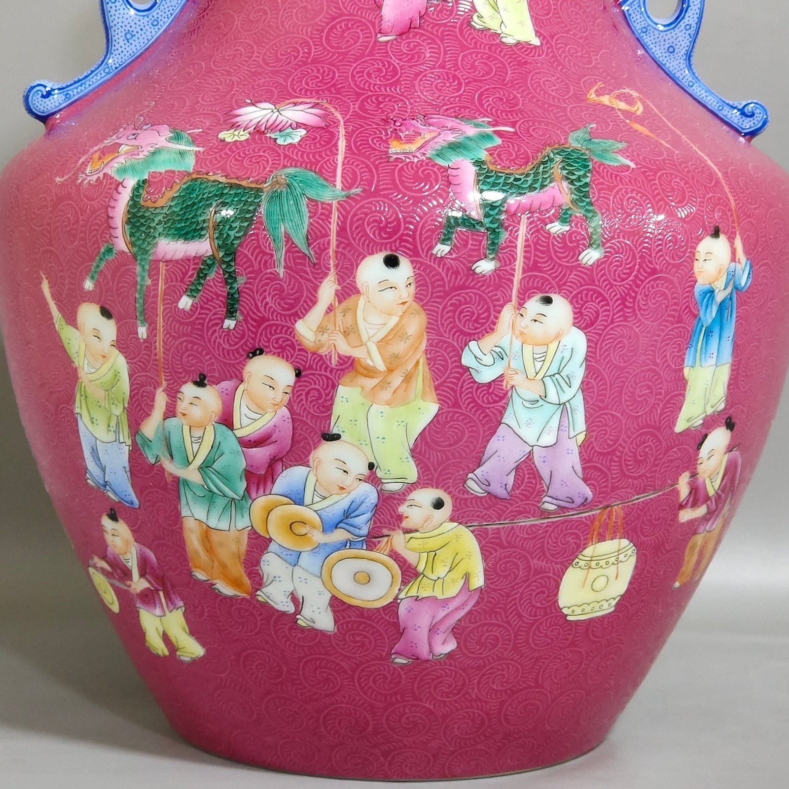 Qing Dynasty Qianlong rouge red baby playing with two ears