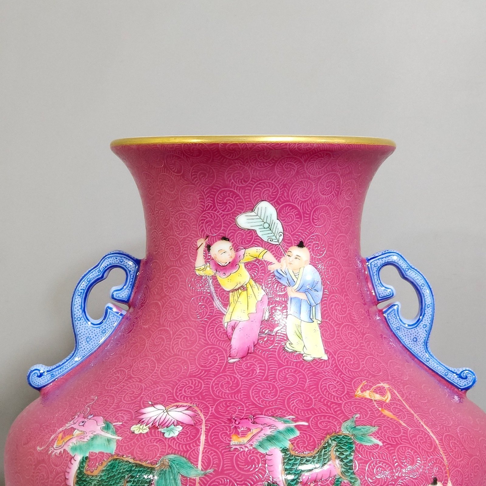 Qing Dynasty Qianlong rouge red baby playing with two ears