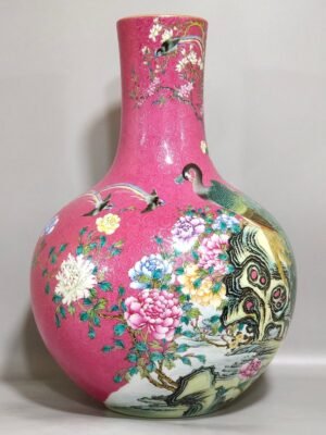 Qing Dynasty Qianlong A rouge red peacock celestial vase