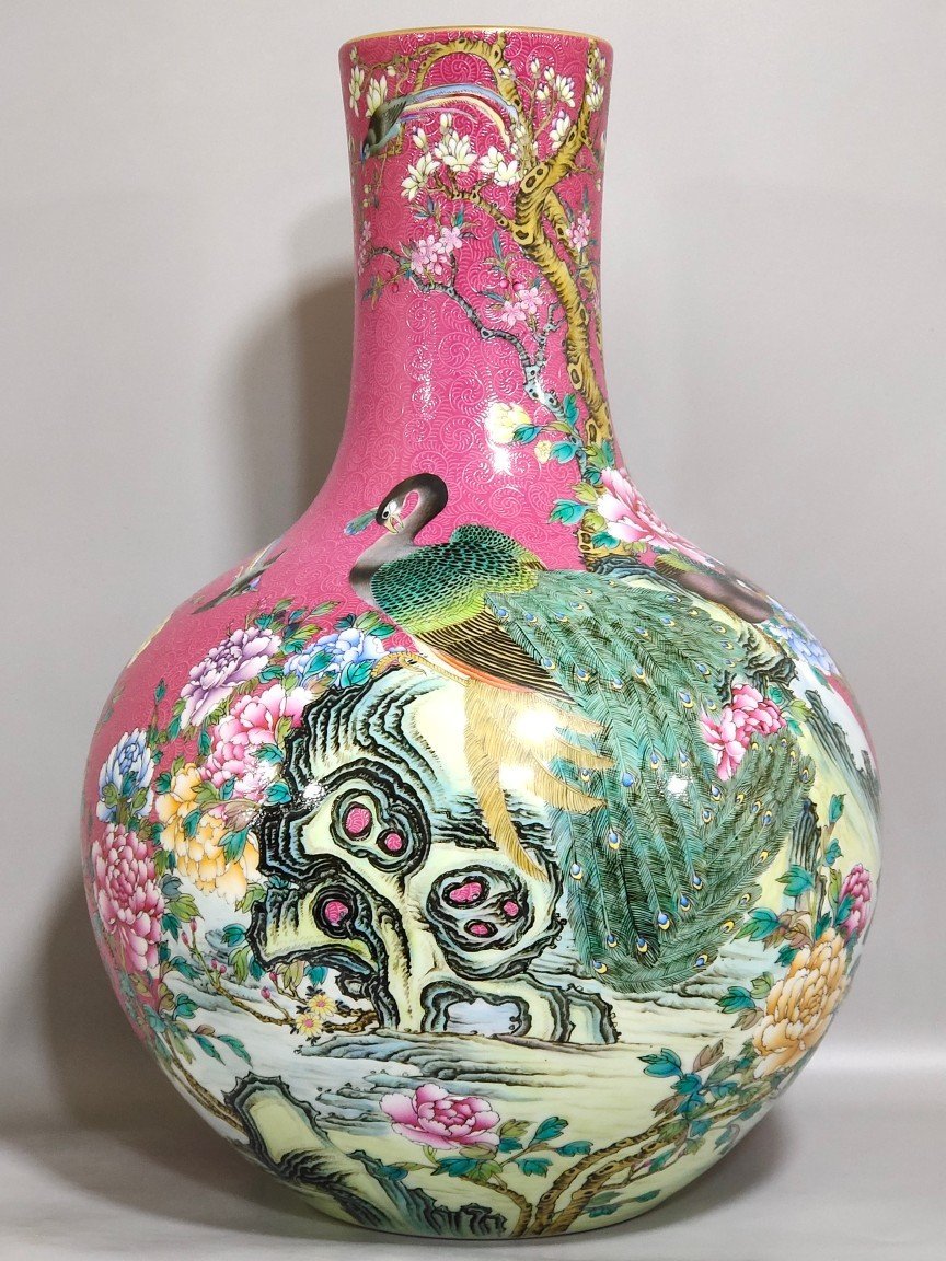 Qing Dynasty Qianlong A rouge red peacock celestial vase