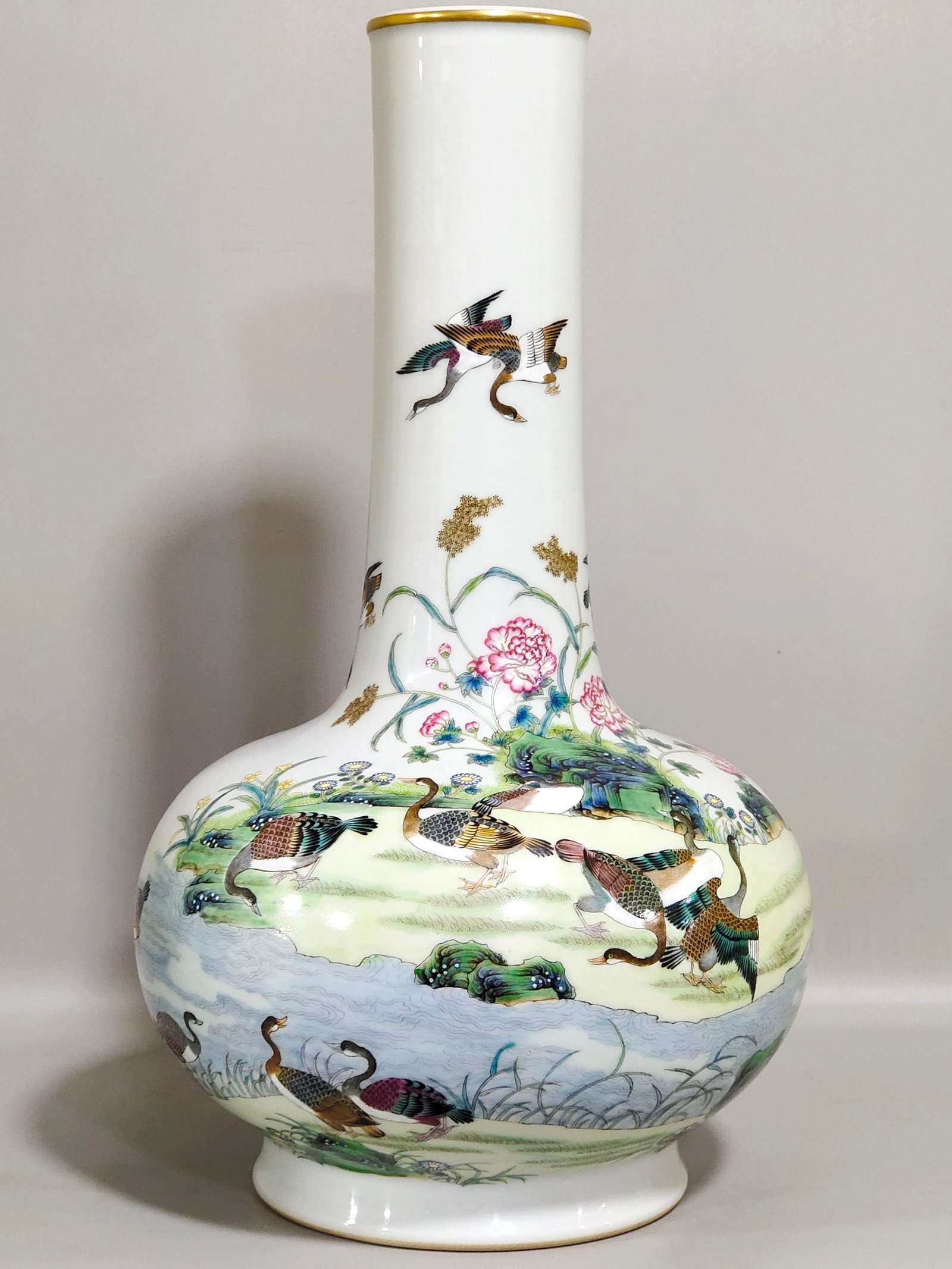 Qing Dynasty Qianlong A long necked vase with pictures of reeds and wild geese and poems written