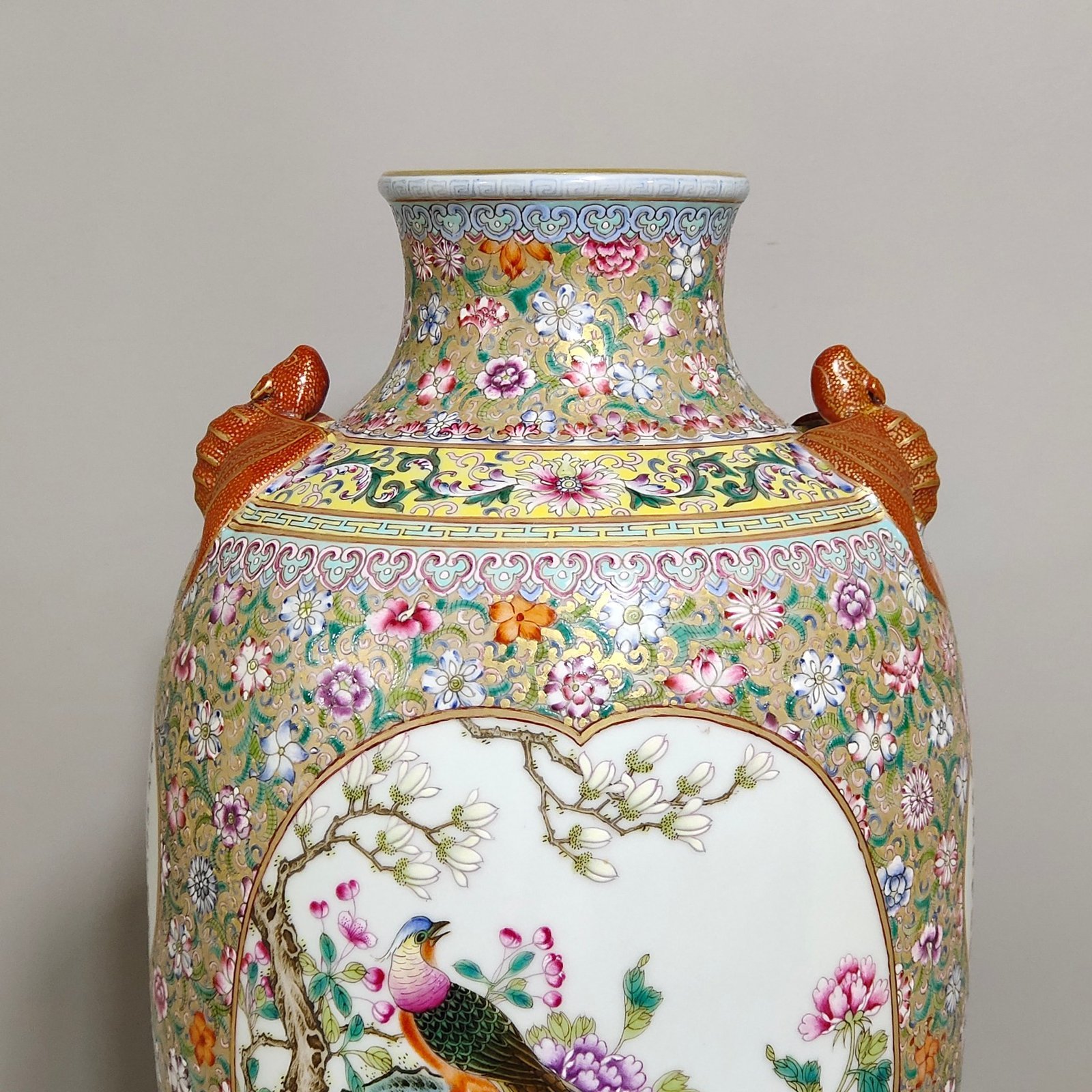 Qing Dynasty Qianlong flower painted gilt window bat eared vase with poems about flowers and birds