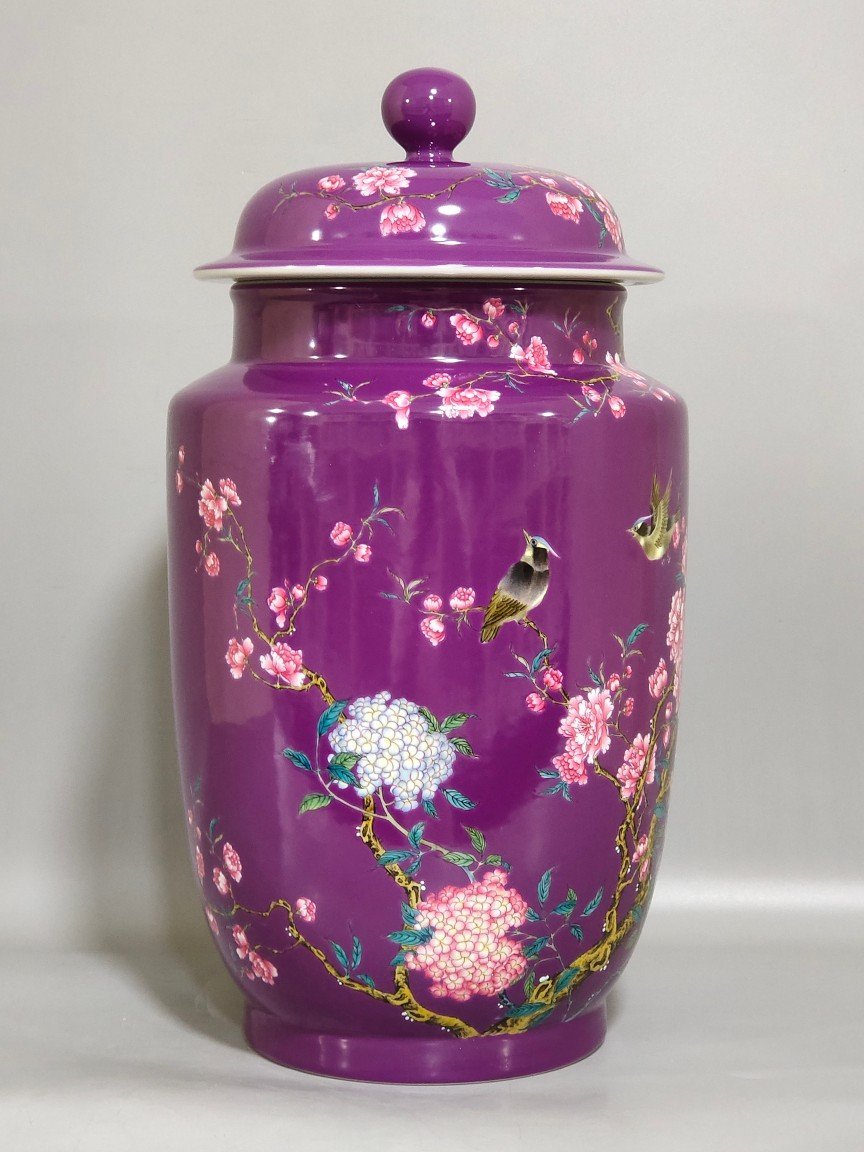 Qing Dynasty Qianlong eggplant skin glazed flower and bird lid jar