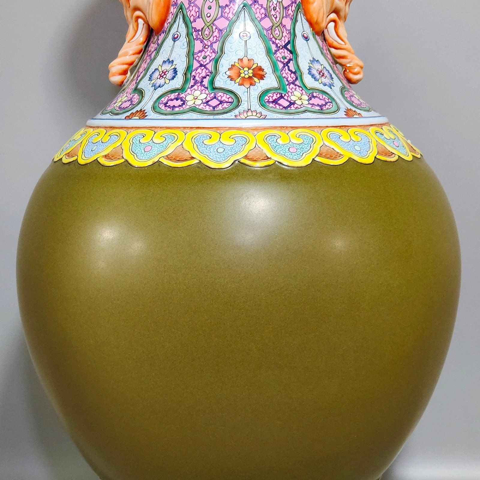 Qing Dynasty Qianlong tea jasper green elephant ear bottle