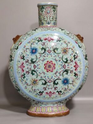 Qing Dynasty Qianlong bean green glaze blessing and longevity continuous moon vase
