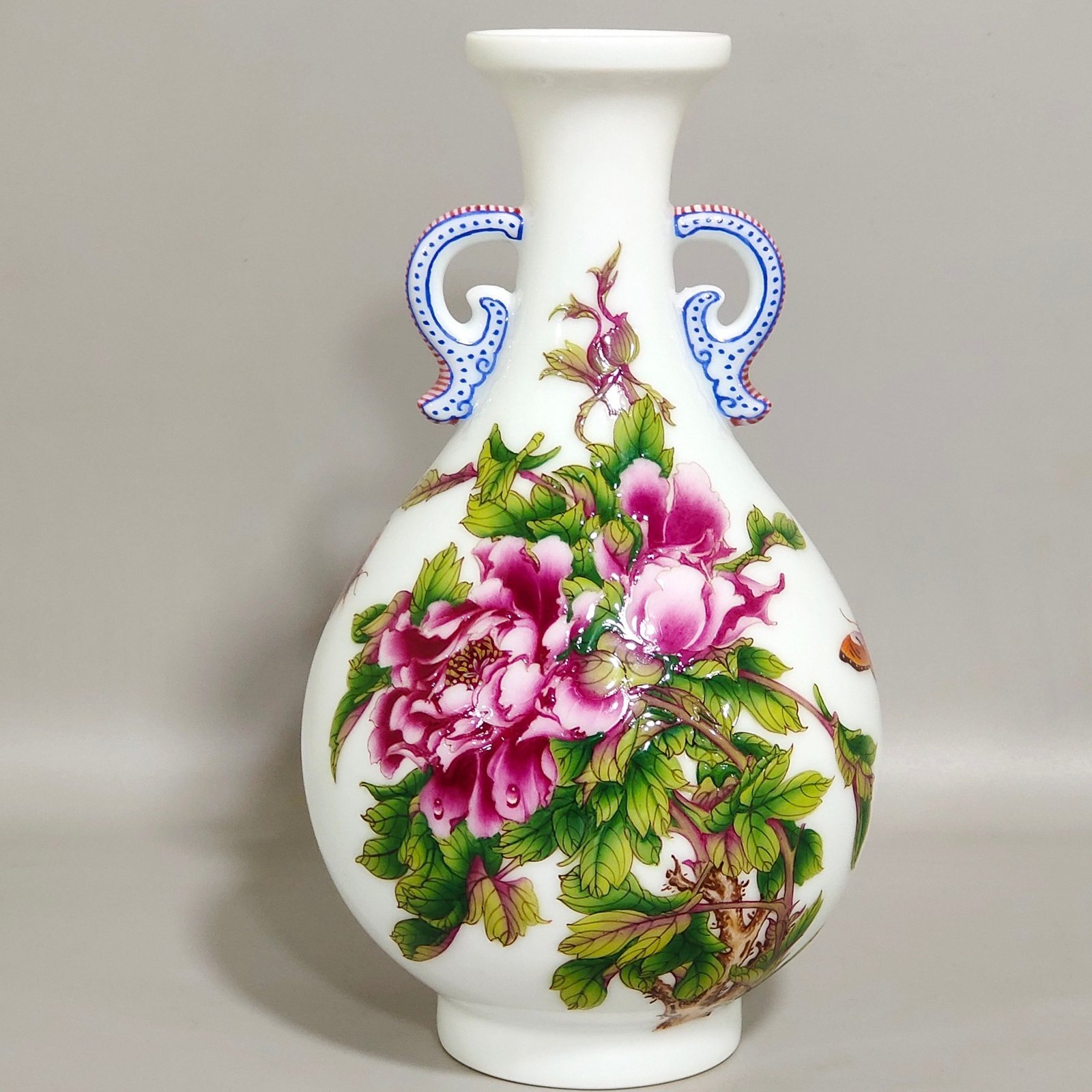 Qing Dynasty Qianlong Castiglione enamel floral double eared jade spring vase