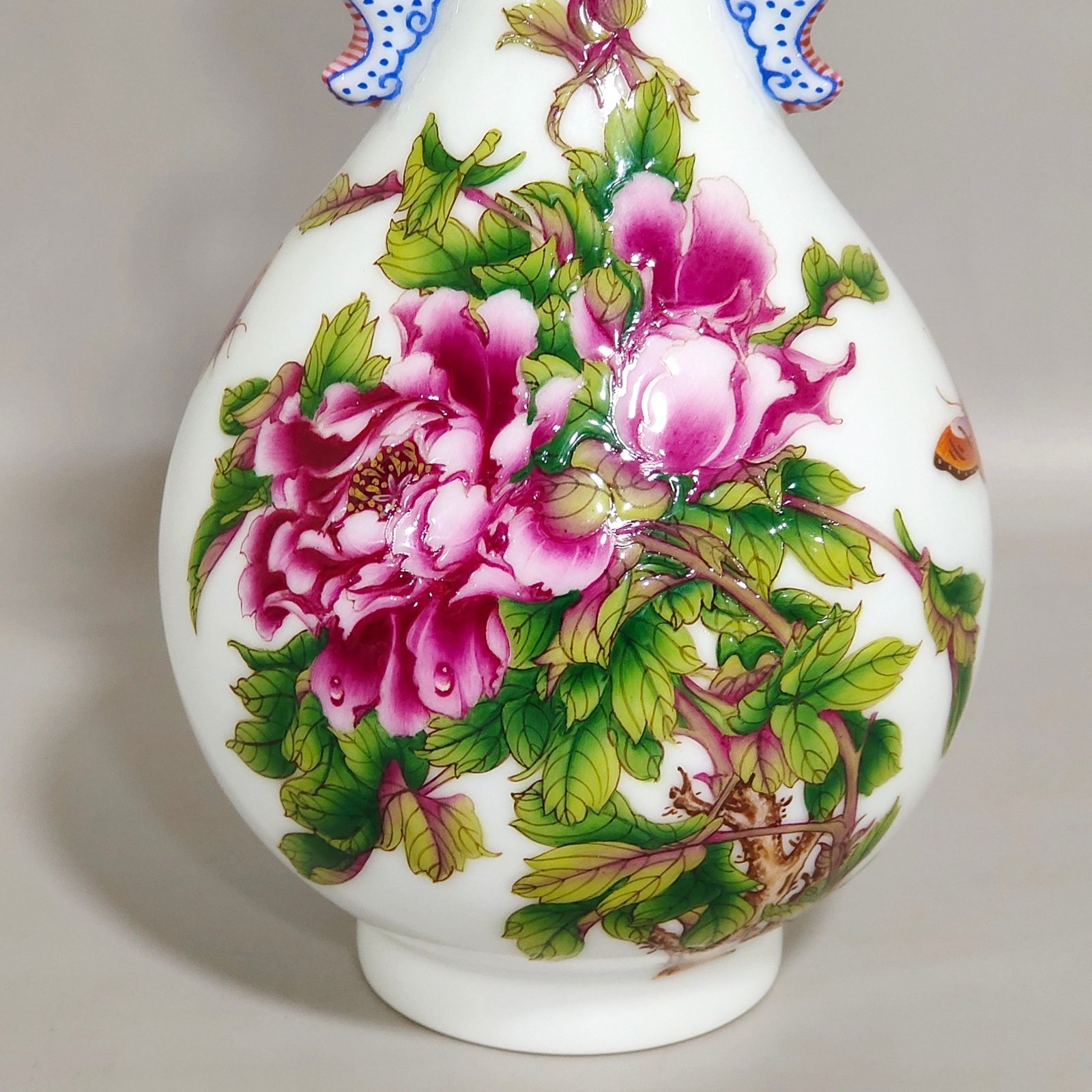 Qing Dynasty Qianlong Castiglione enamel floral double eared jade spring vase