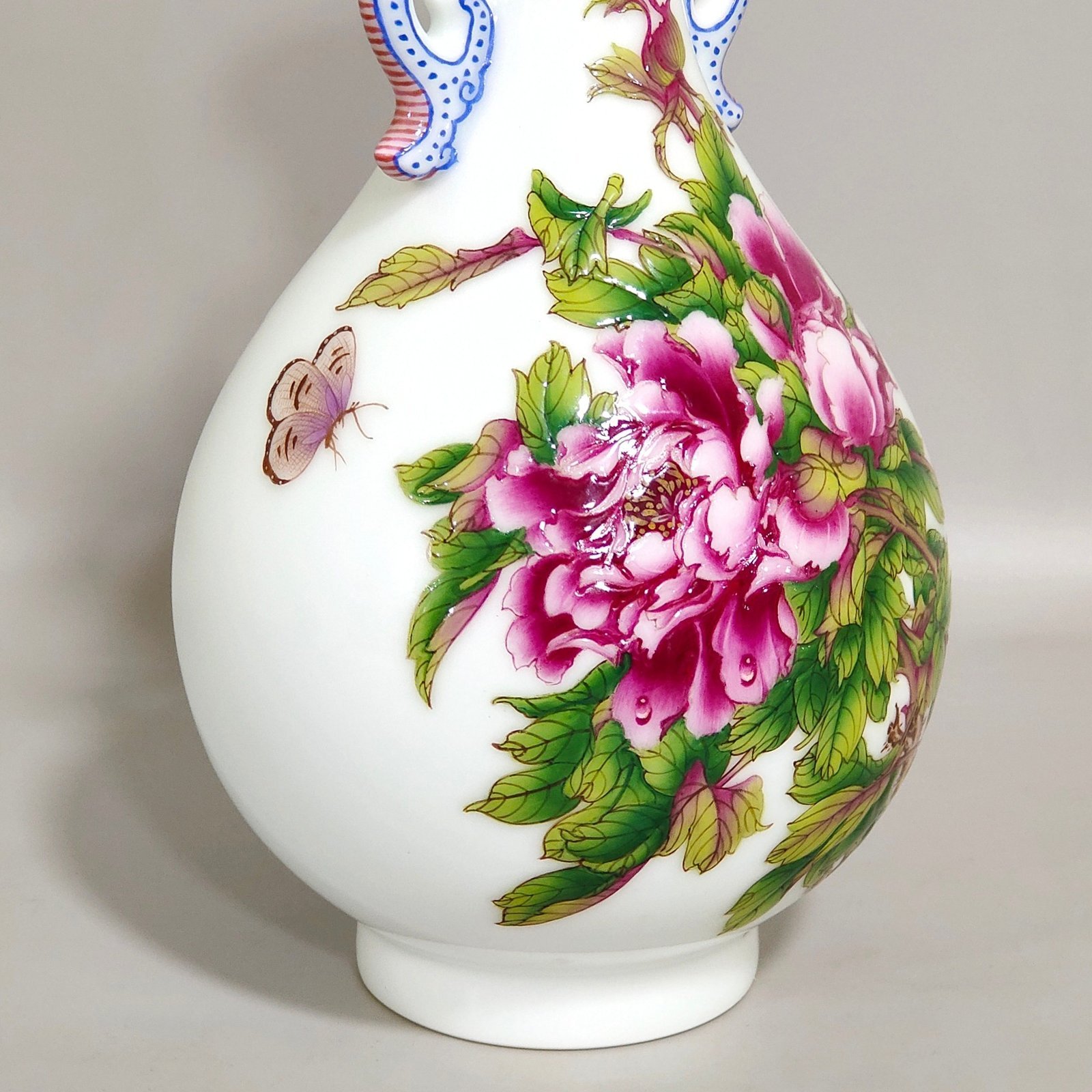 Qing Dynasty Qianlong Castiglione enamel floral double eared jade spring vase