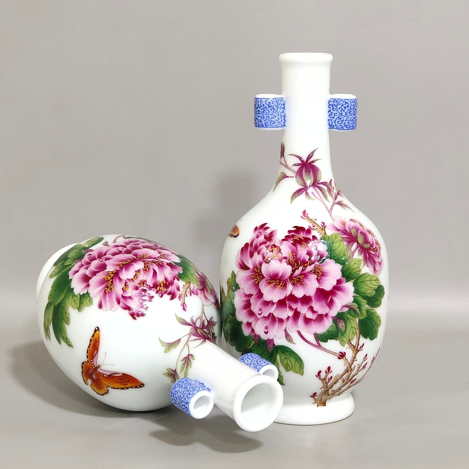 Qing Dynasty Qianlong Castiglione enamel floral amphorae