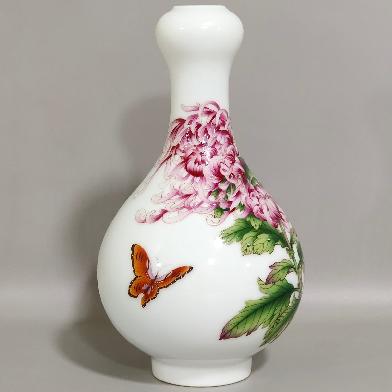 Qing Dynasty Qianlong Castiglione enamel vase with flowers and poems