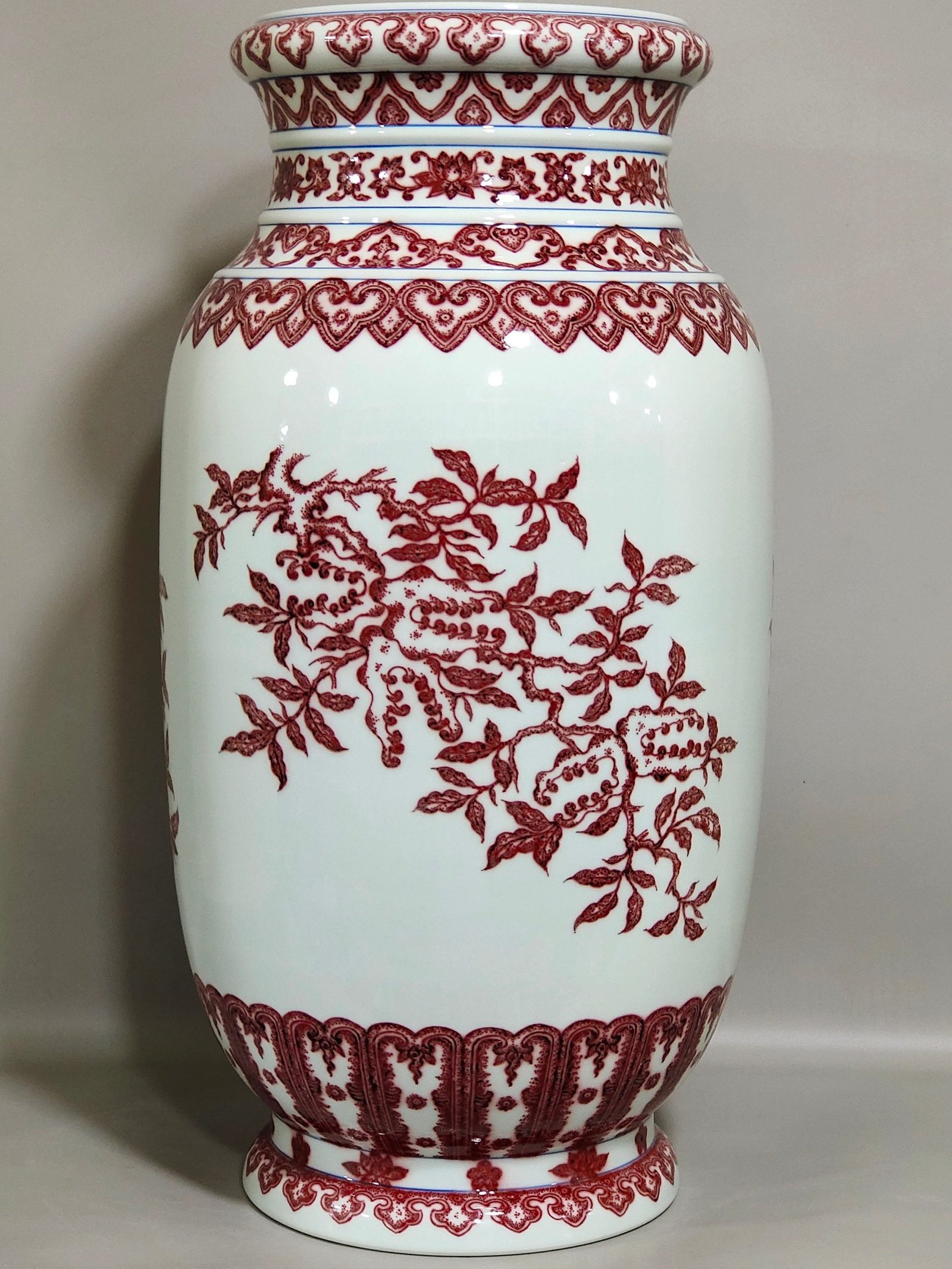 Qing Dynasty Qianlong underglaze red three barrel bottle