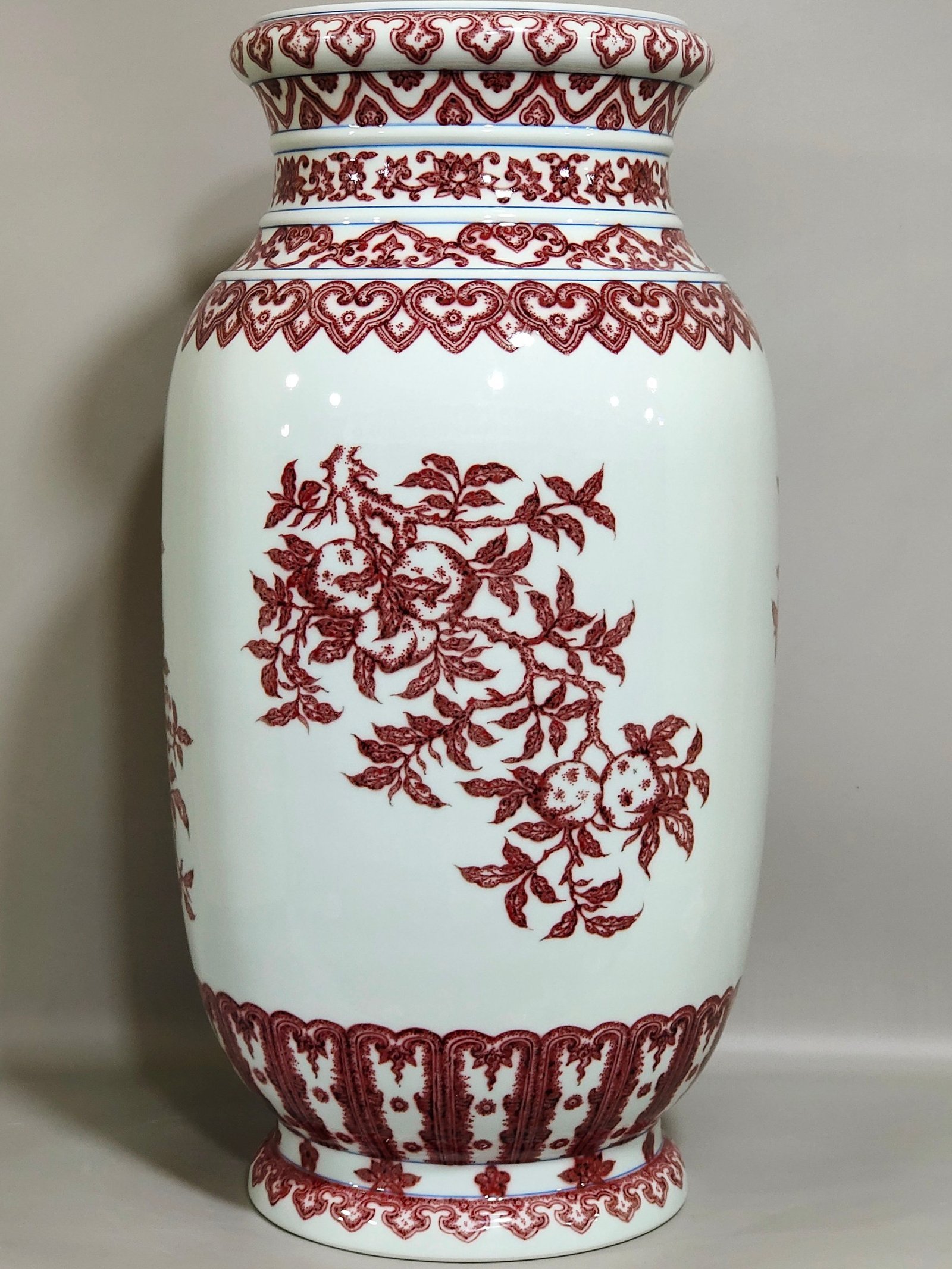 Qing Dynasty Qianlong underglaze red three barrel bottle