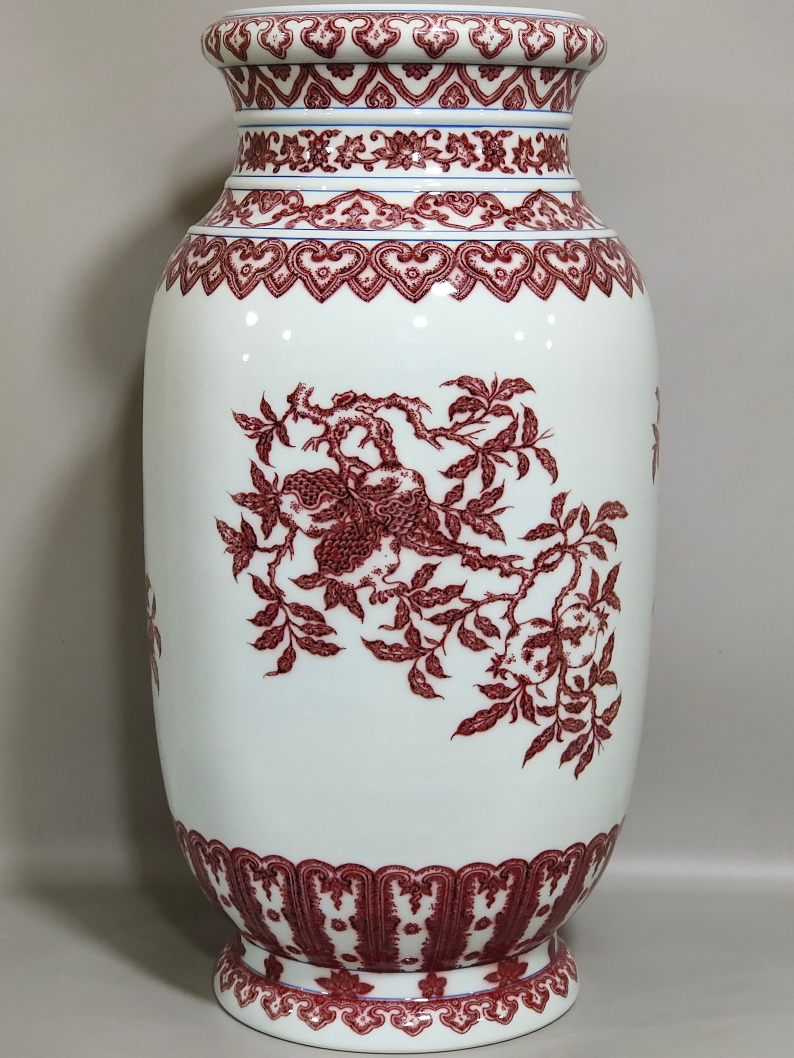 Qing Dynasty Qianlong underglaze red three barrel bottle