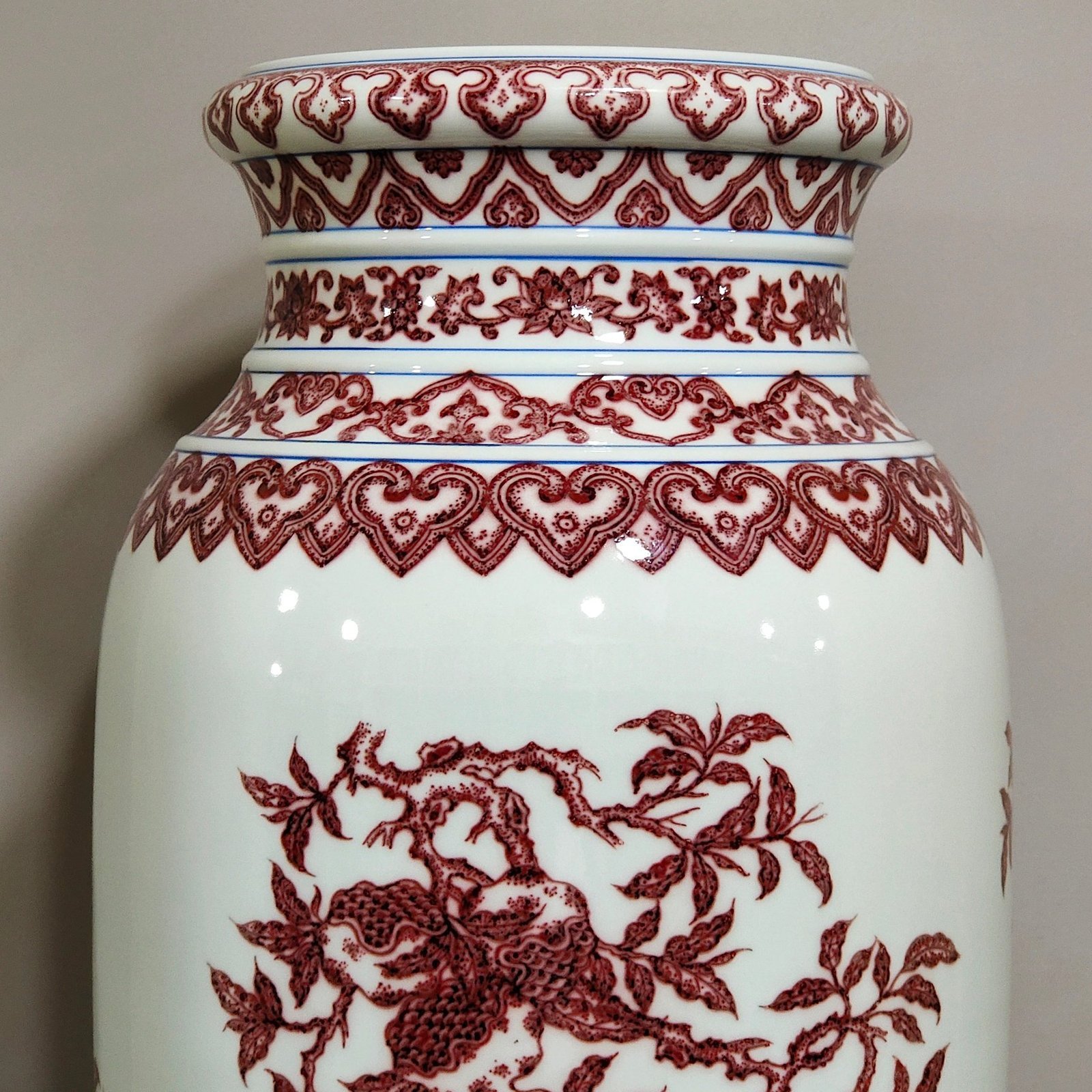 Qing Dynasty Qianlong underglaze red three barrel bottle