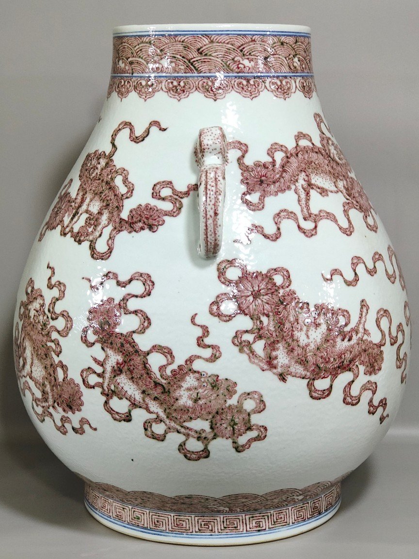 Qing Dynasty Qianlong underglaze red Buddha bucket statue