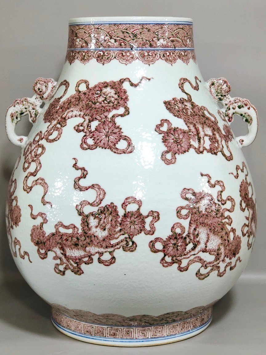 Qing Dynasty Qianlong underglaze red Buddha bucket statue