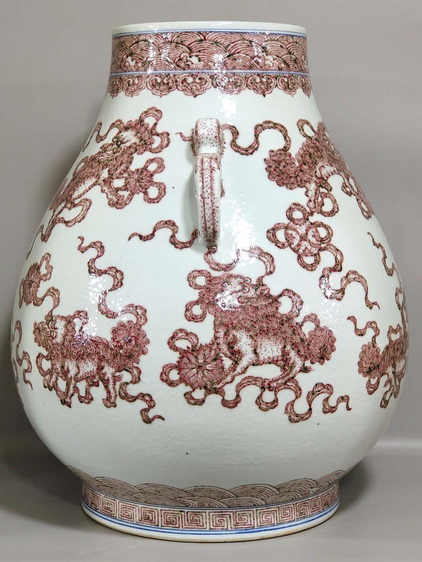 Qing Dynasty Qianlong underglaze red Buddha bucket statue