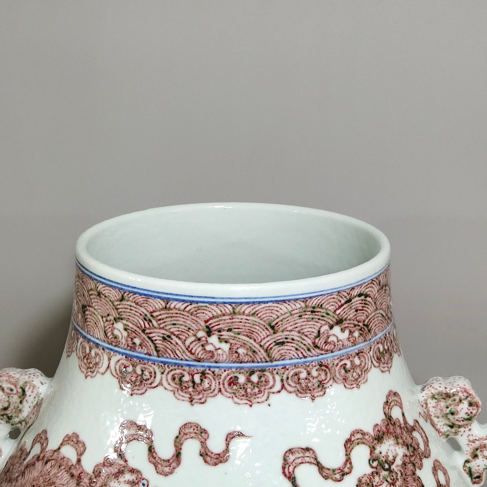 Qing Dynasty Qianlong underglaze red Buddha bucket statue