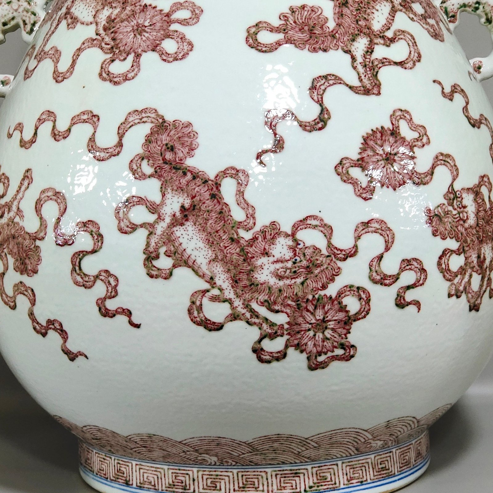 Qing Dynasty Qianlong underglaze red Buddha bucket statue