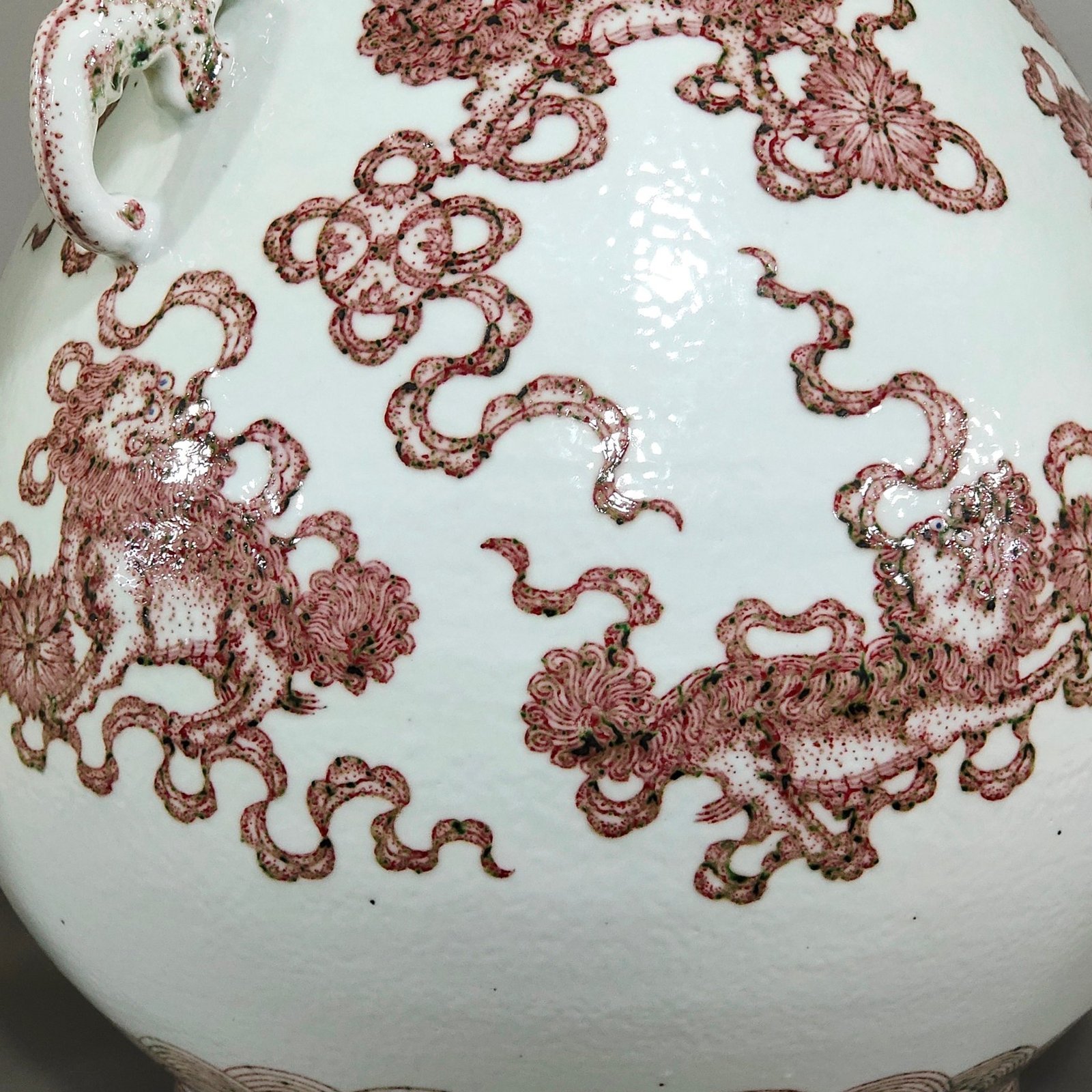 Qing Dynasty Qianlong underglaze red Buddha bucket statue