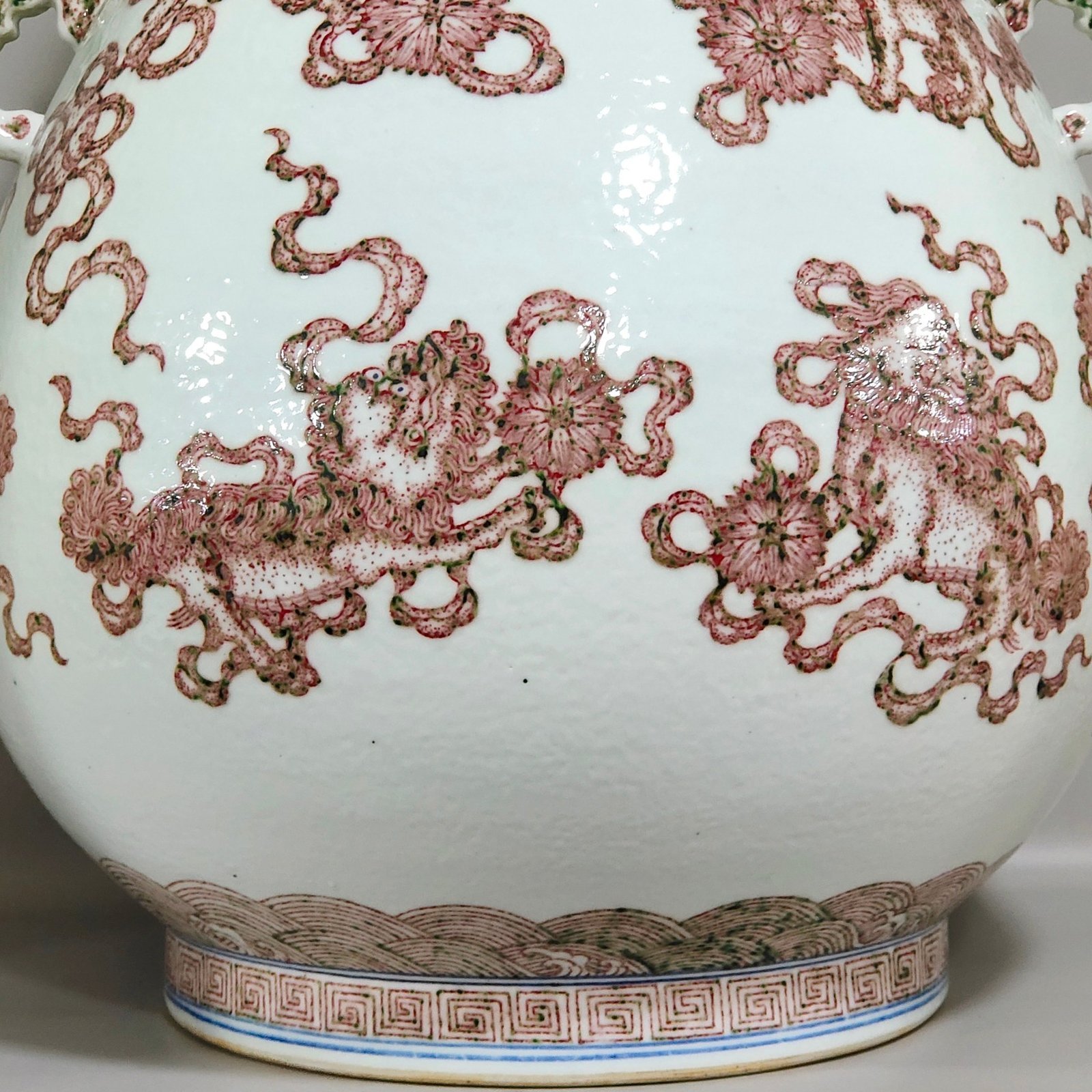 Qing Dynasty Qianlong underglaze red Buddha bucket statue