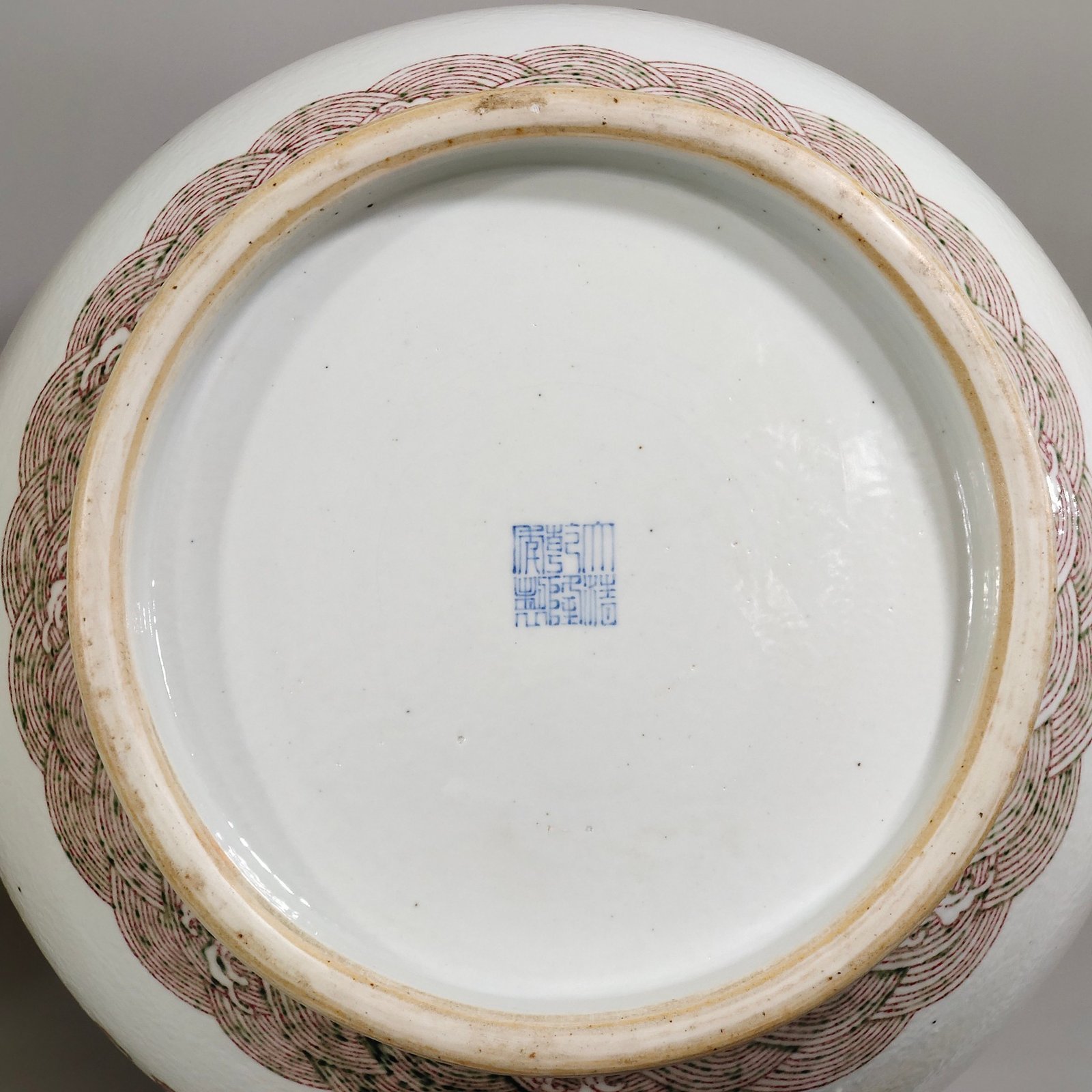 Qing Dynasty Qianlong underglaze red Buddha bucket statue