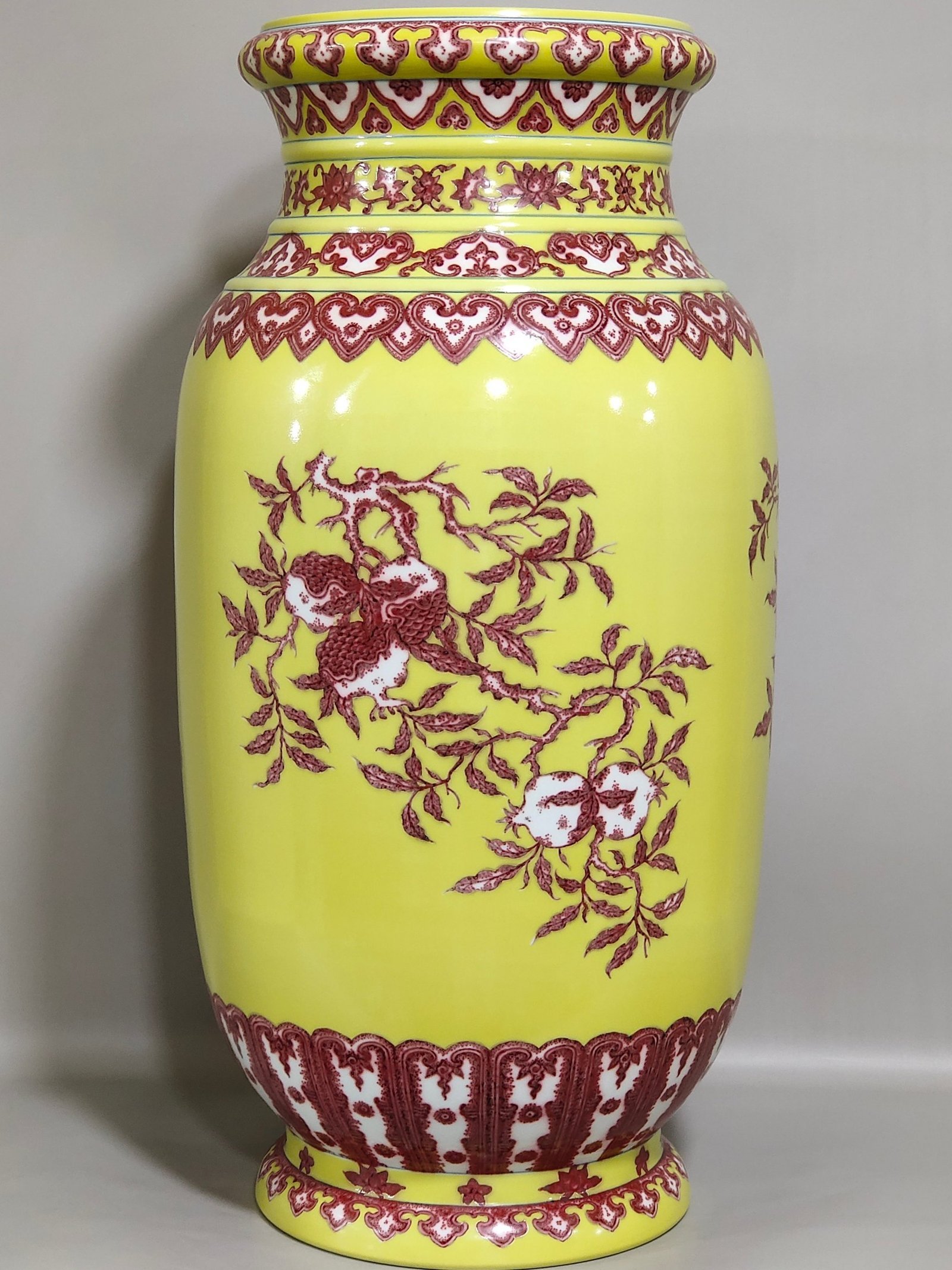 Qing Dynasty Qianlong underglaze red and yellow three barrel bottle