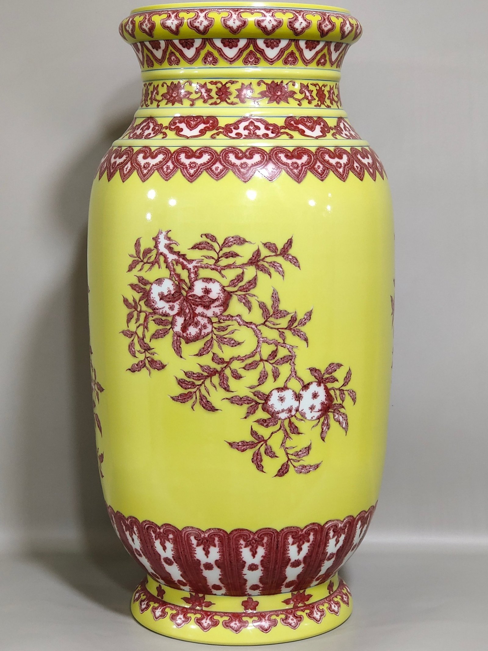 Qing Dynasty Qianlong underglaze red and yellow three barrel bottle