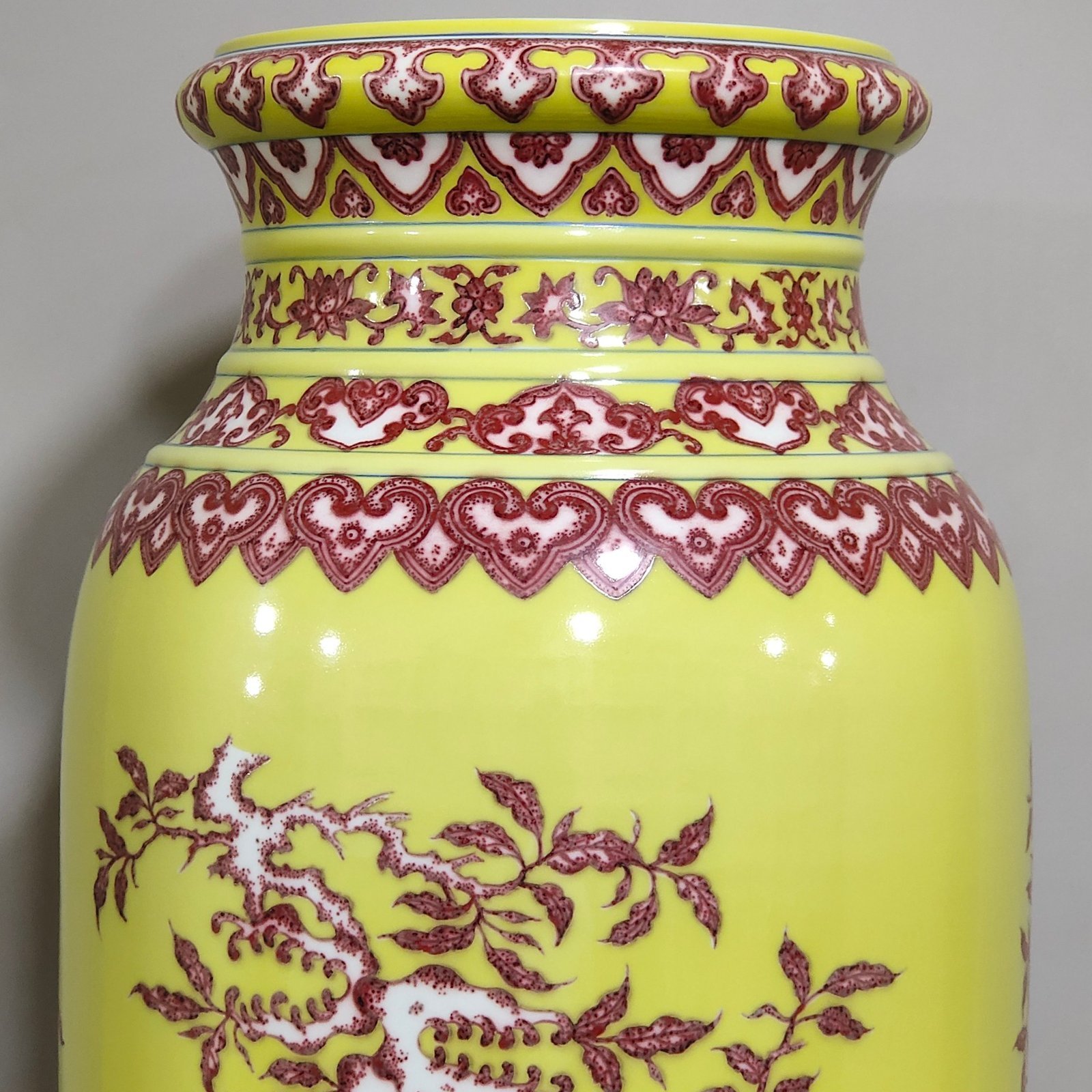 Qing Dynasty Qianlong underglaze red and yellow three barrel bottle