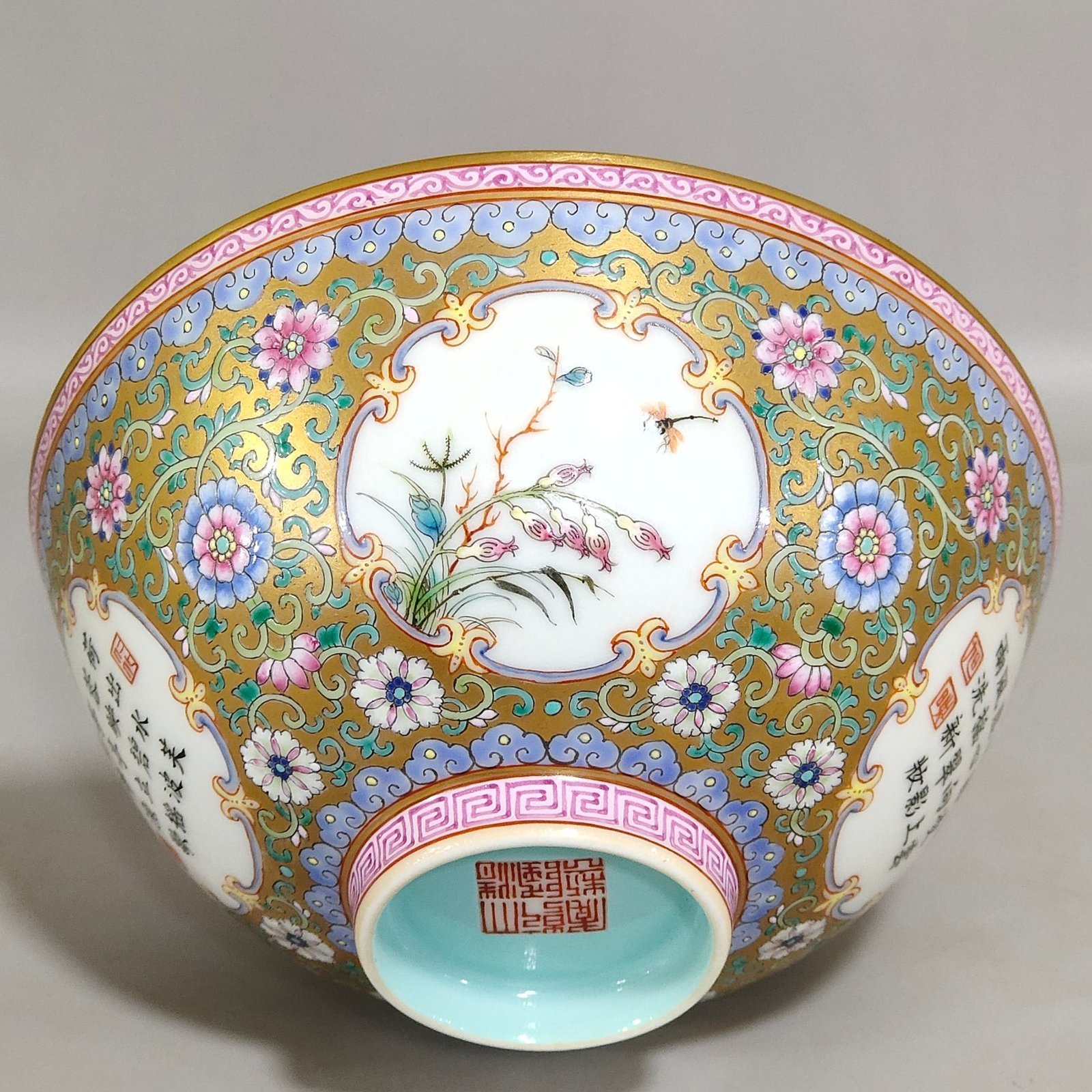 Qing Dynasty Qianlong a gold plated window opening flower inscribed bowl