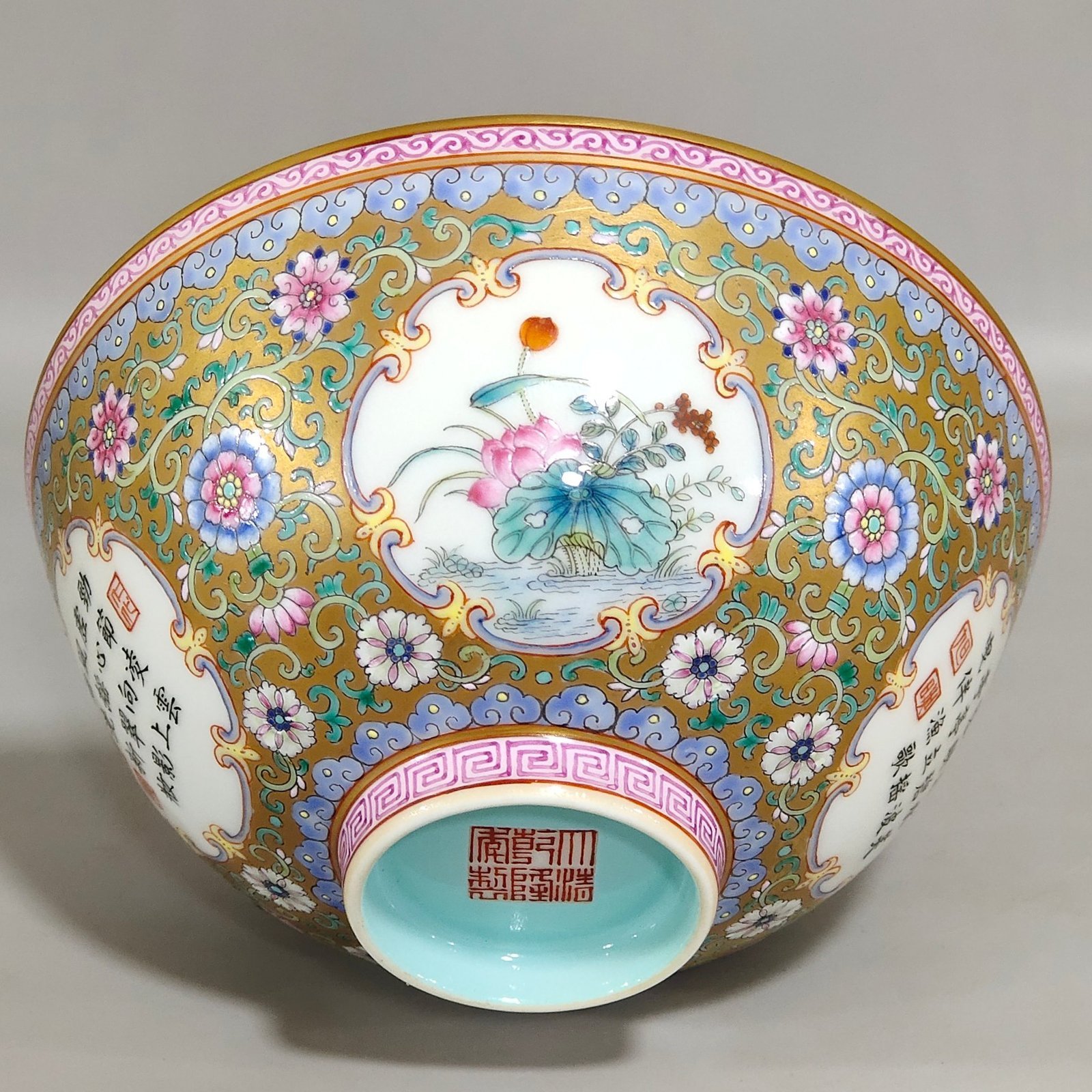 Qing Dynasty Qianlong a gold plated window opening flower inscribed bowl