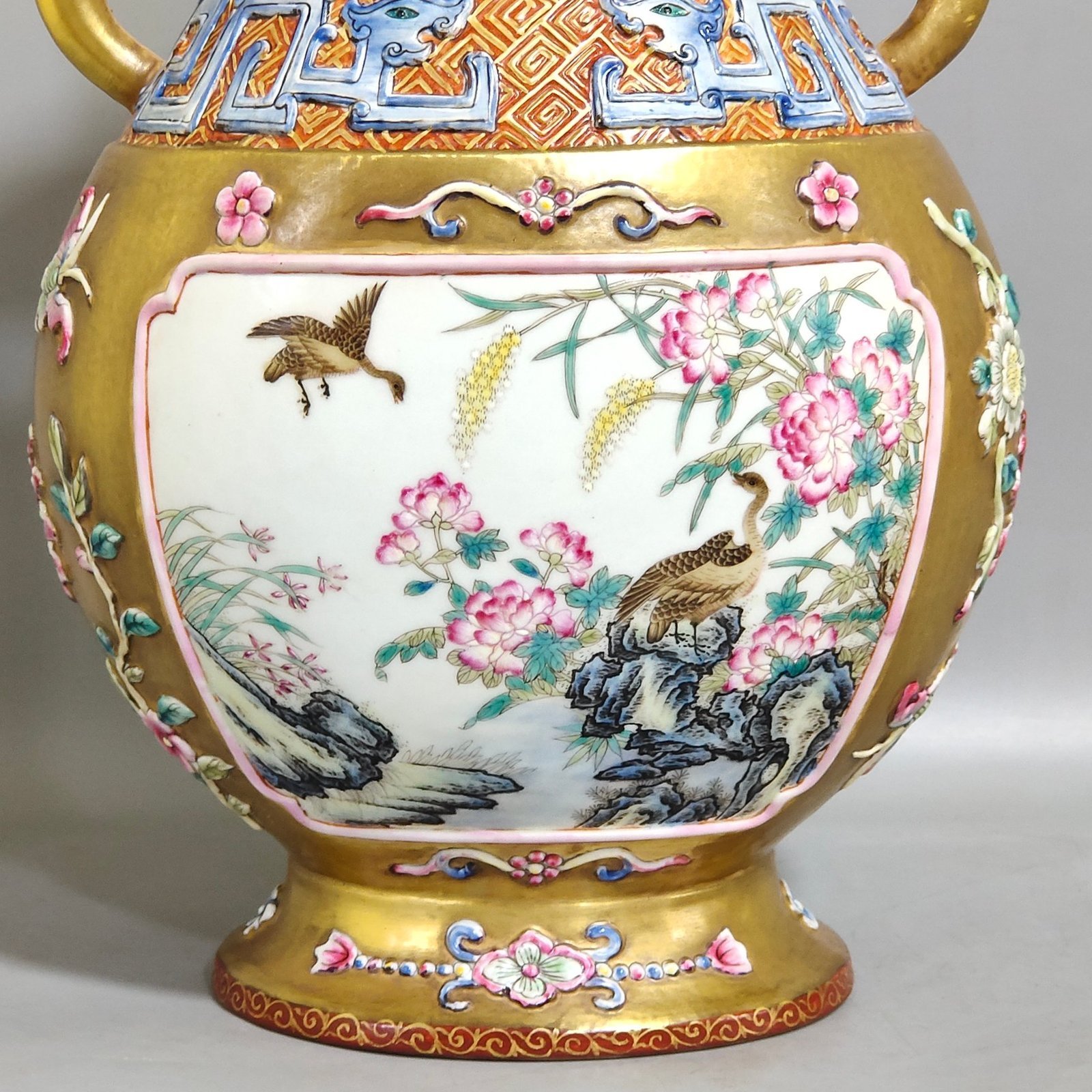 Qing Dynasty Qianlong gold plated window quail reed wild goose and elephant ear vase