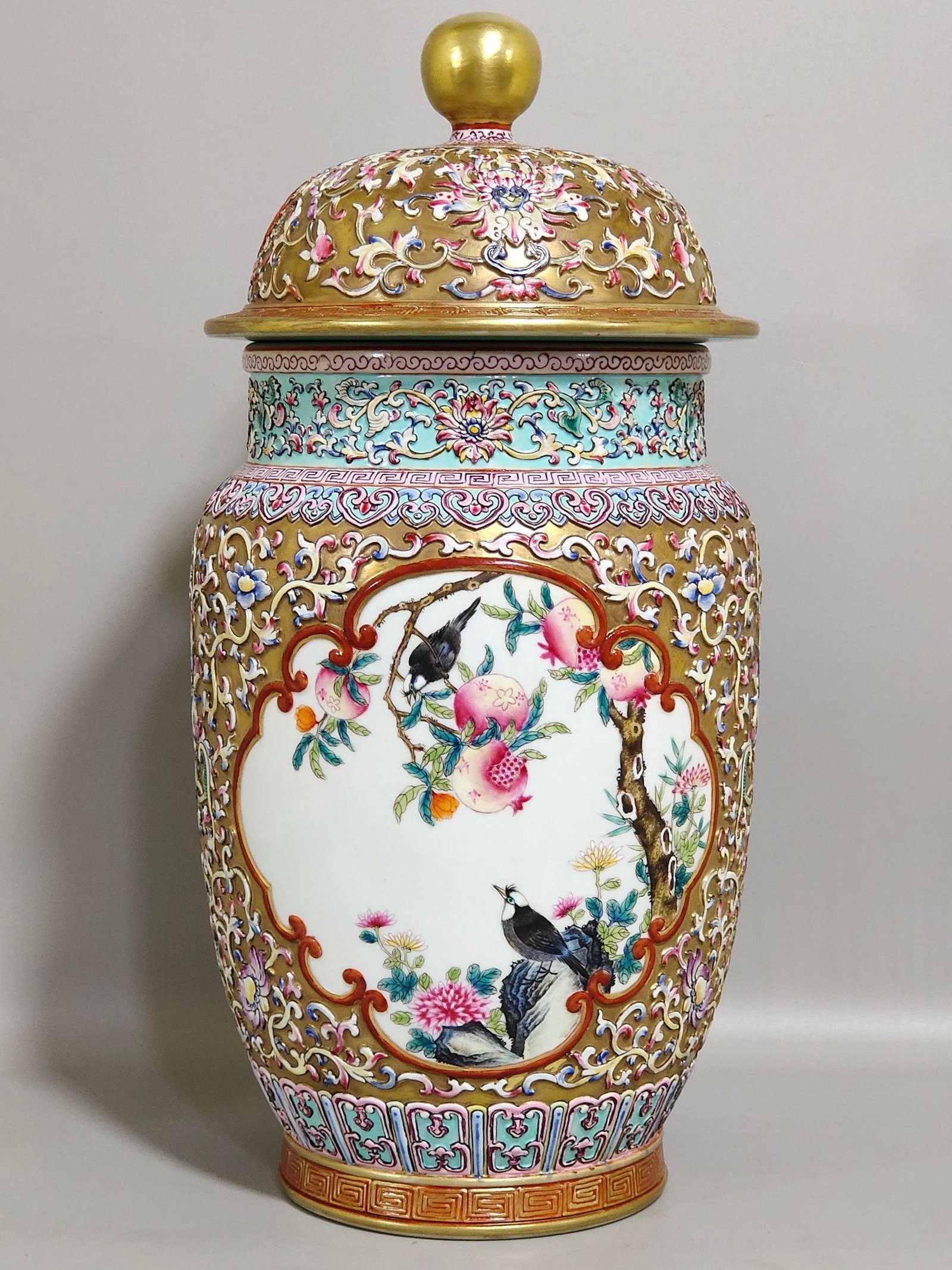 Qing Dynasty Qianlong gold plated relief with window pines and cranes to promote longevity and covered jar