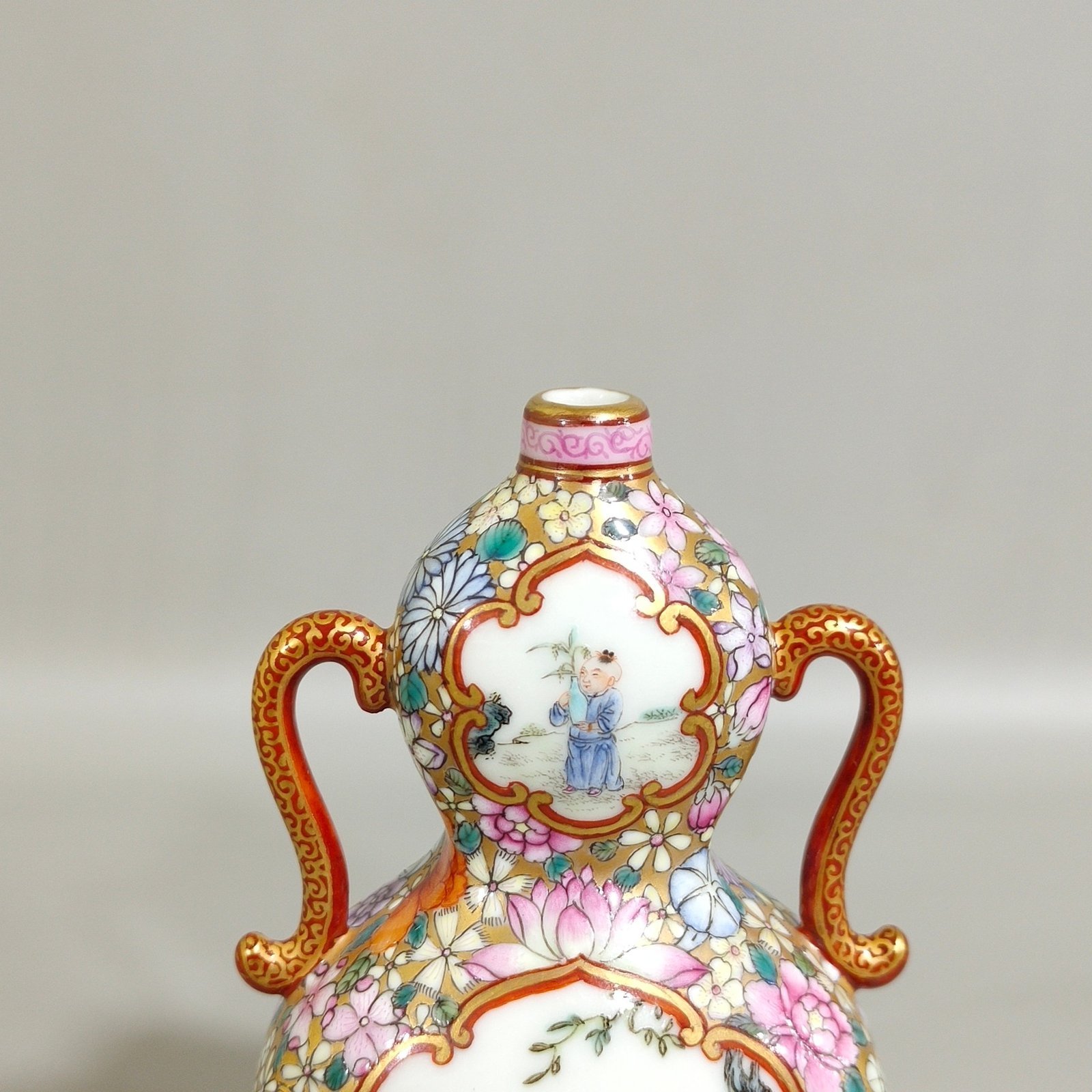 Qing Dynasty Qianlong Golden Ground Hundred Flowers Open Window Boy’s Flat Gourd Vase