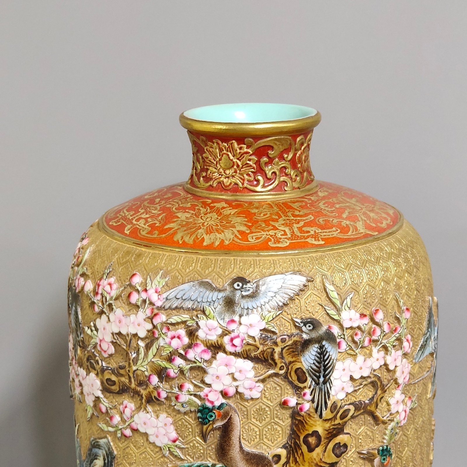 Qing Dynasty Qianlong gold carved flower and bird plum vase