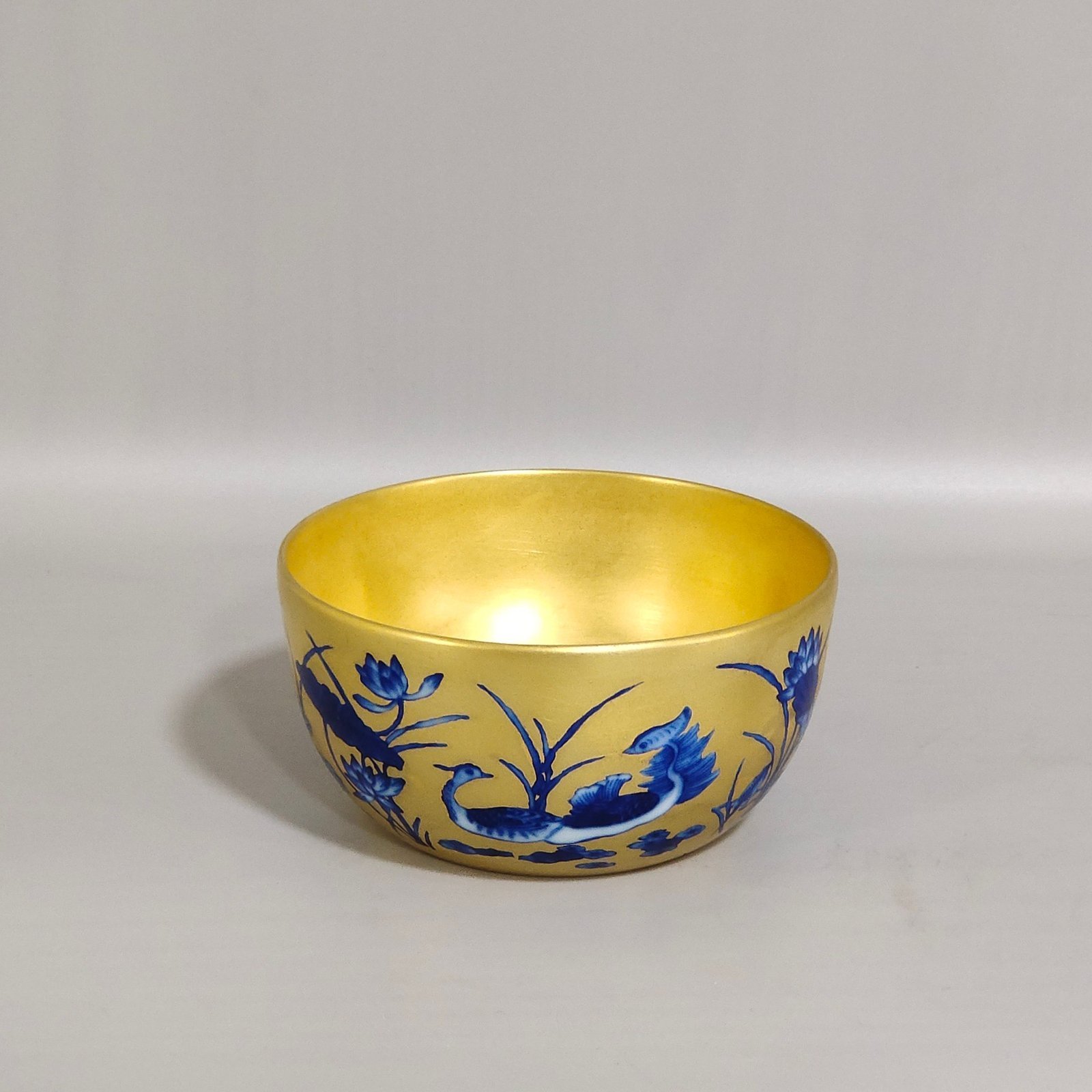 Qing Dynasty Qianlong Golden Lotus Cup with Mandarin Ducks Playing in the Water
