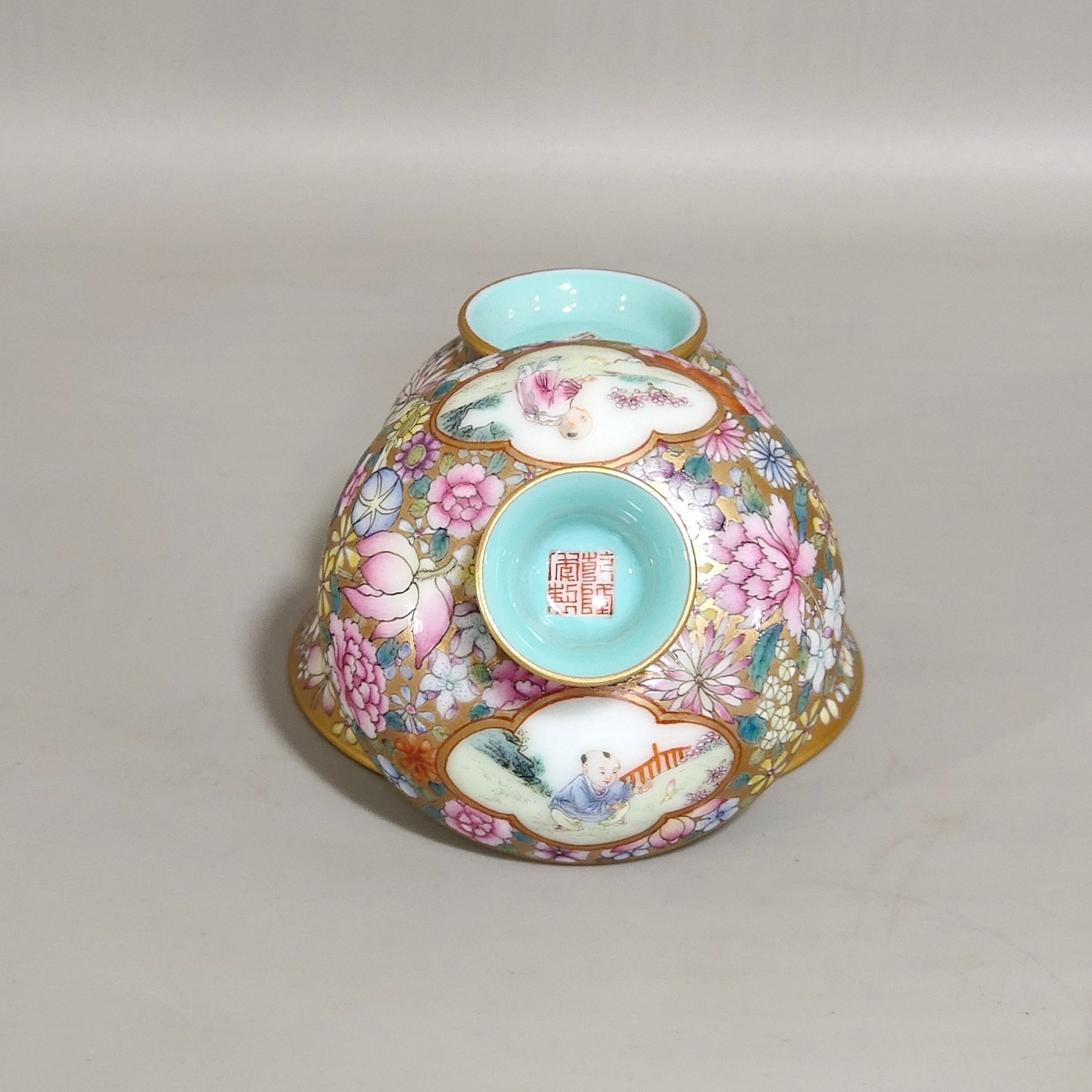 Qing Dynasty Qianlong a gold bottomed boy’s bowl with a hundred flowers and a window