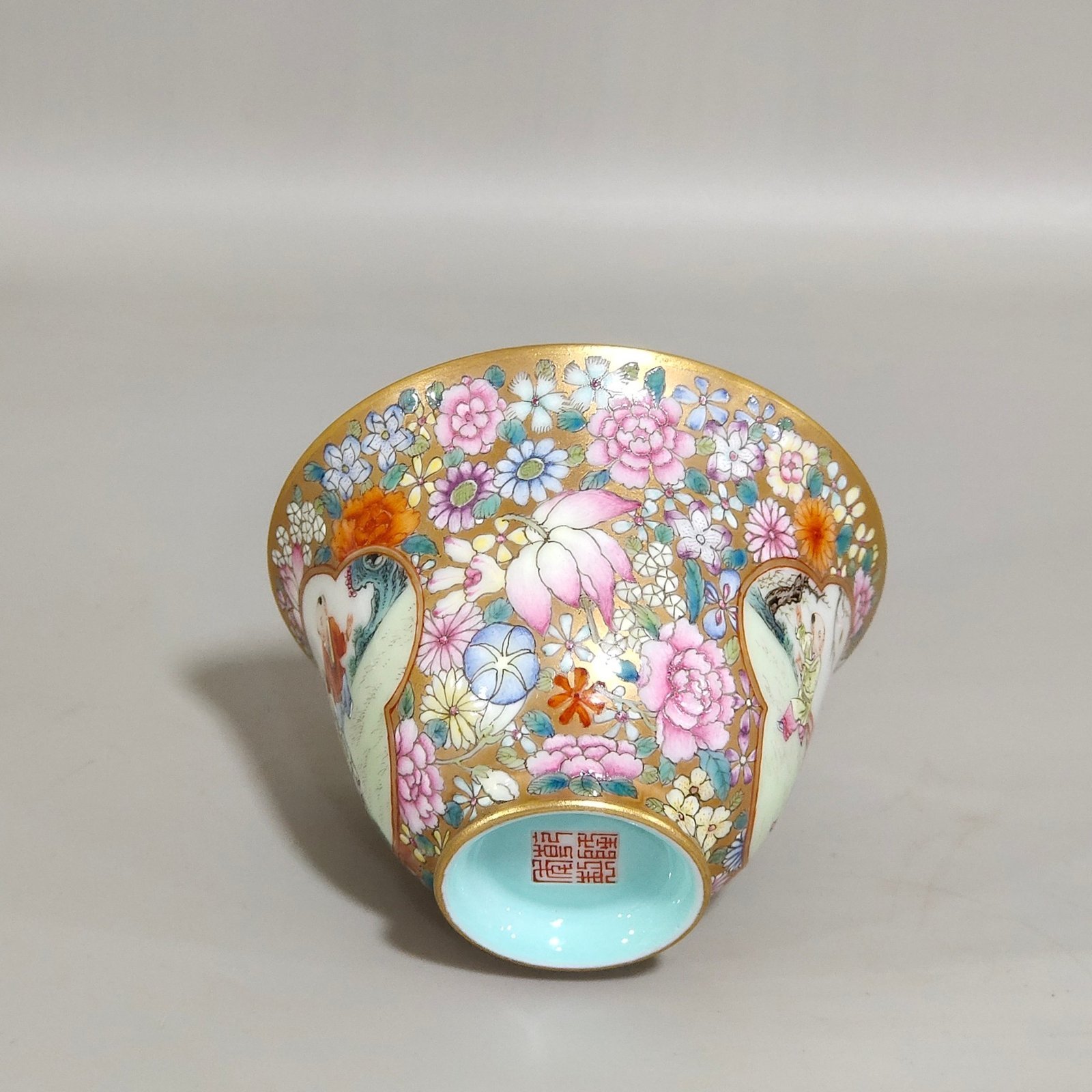 Qing Dynasty Qianlong a gold bottomed boy’s bowl with a hundred flowers and a window