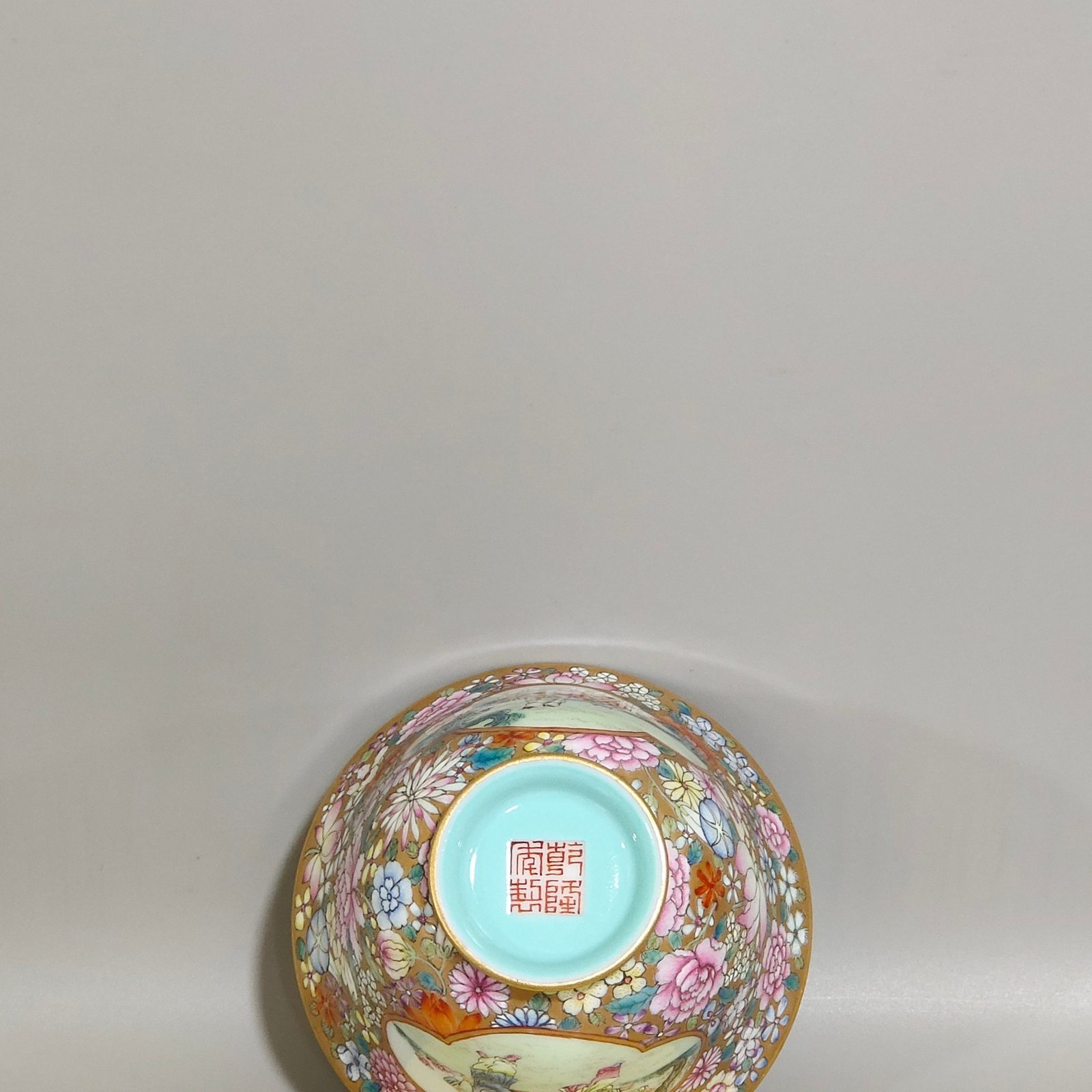 Qing Dynasty Qianlong a gold bottomed boy’s bowl with a hundred flowers and a window