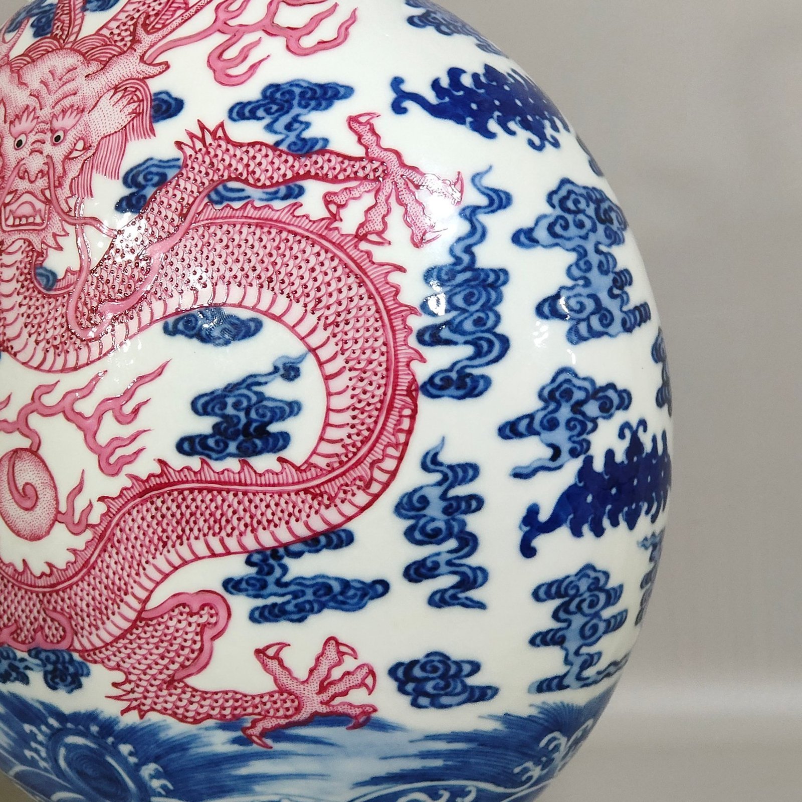 Qing Dynasty Qianlong blue and white and rouge red auspicious cloud and dragon vase
